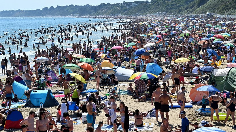 UK beaches crowded, WHO warns of cases 'upsurge': COVID-19 ...