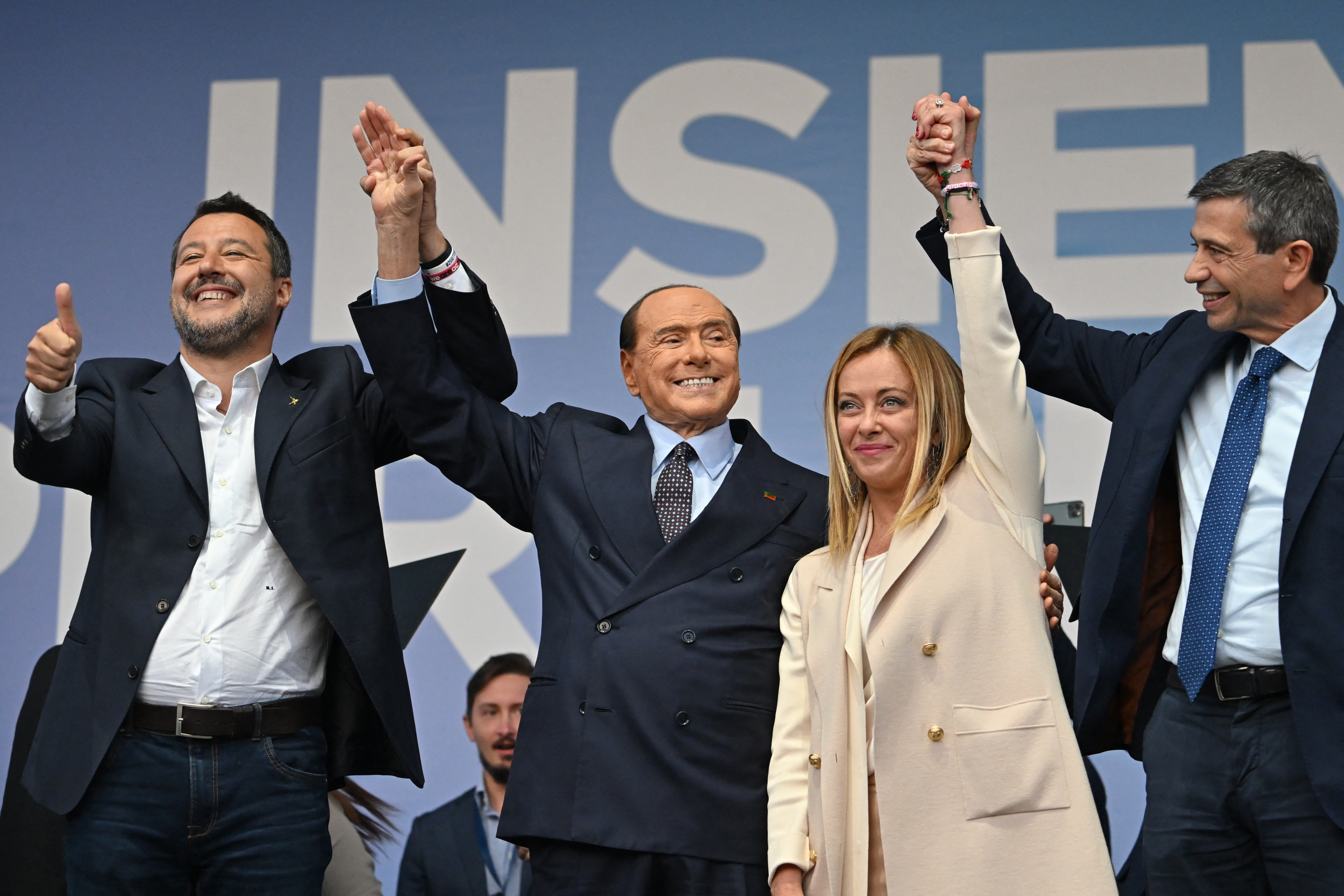Lega leader Matteo Salvini, Forza Italia leader Silvio Berlusconi, Giorgia Meloni, and Italian centre-right lawmaker Maurizio Lupi at a rally. Alberto Pizzoli / AFP
