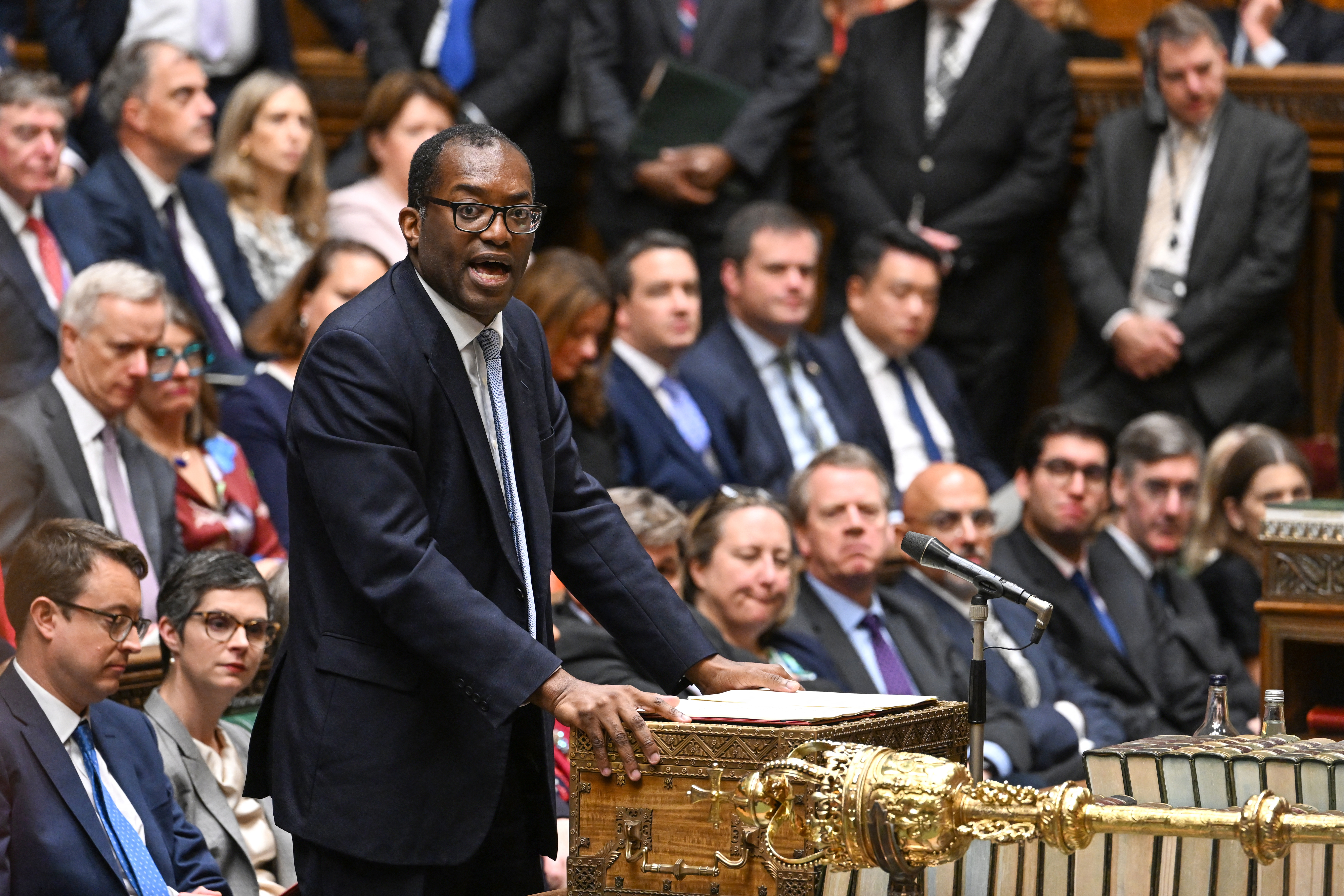 British Finance Minister Kwasi Kwarteng outlined tax cuts in the House of Commons that has led to a weaker pound. Jessica Taylor/AFP