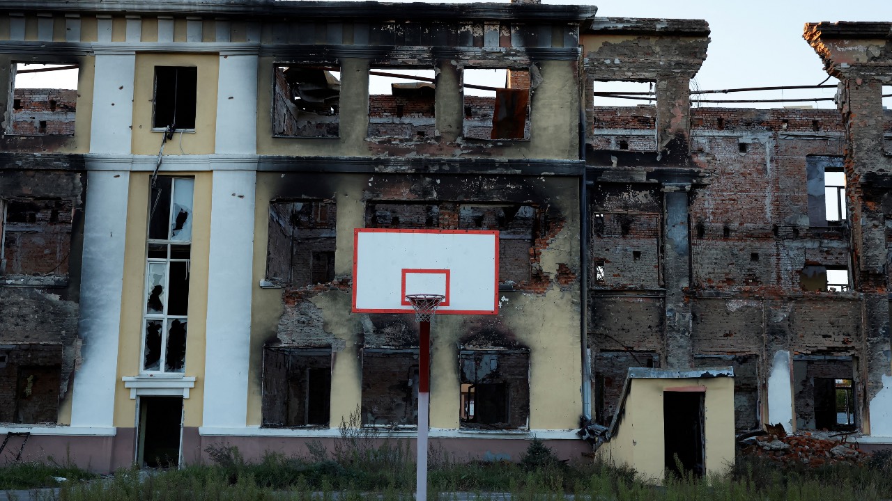 A basketball hoop is seen in a playground of a school that was destroyed by Russian military strikes in Kharkiv. /Clodagh Kilcoyne/Reuters