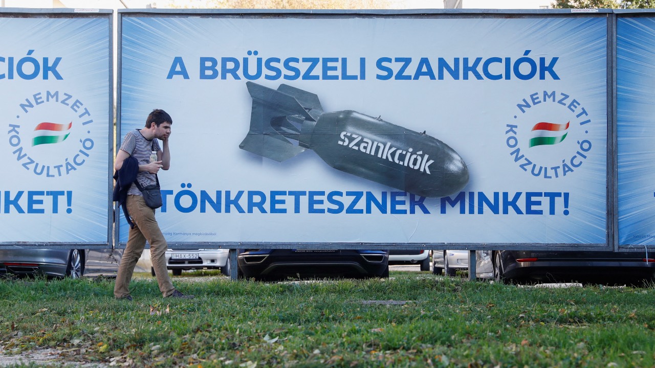 In Budapest, government billboards read 'Brussels sanctions are destroying us,' depicting EU sanctions as a bomb. /Bernadett Szabo/Reuters