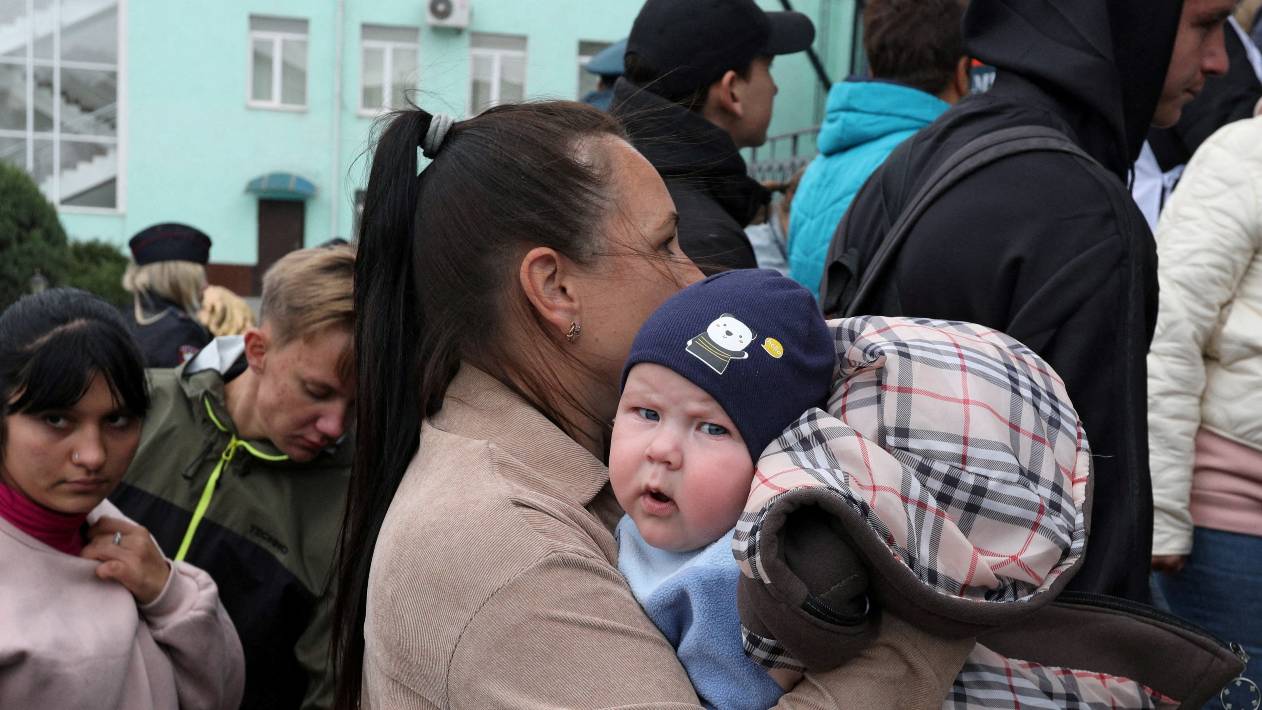 Civilians evacuated from the Russian-controlled Kherson region arrive at a railway station in the town of Dzhankoi, Crimea. /Alexey Pavlishak/Reuters