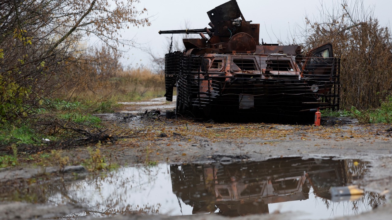 A tank is seen in a village where fierce battles under Russian occupation destroyed homes and cut the village in two by the shelling of the bridge in Tsupivka, Ukraine. /Clodagh Kilcoyne/Reuters