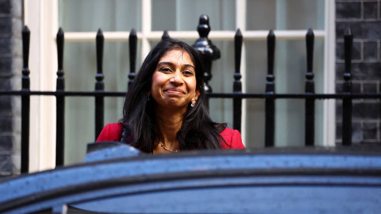 British Home Secretary Suella Braverman smiles outside Number 10 Downing Street in London. /Hannah McKay/Reuters