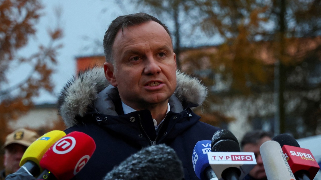Polish President Andrzej Duda speaks to media during his visit to the site of the explosion in Przewodow. /Kacper Pempel/Reuters
