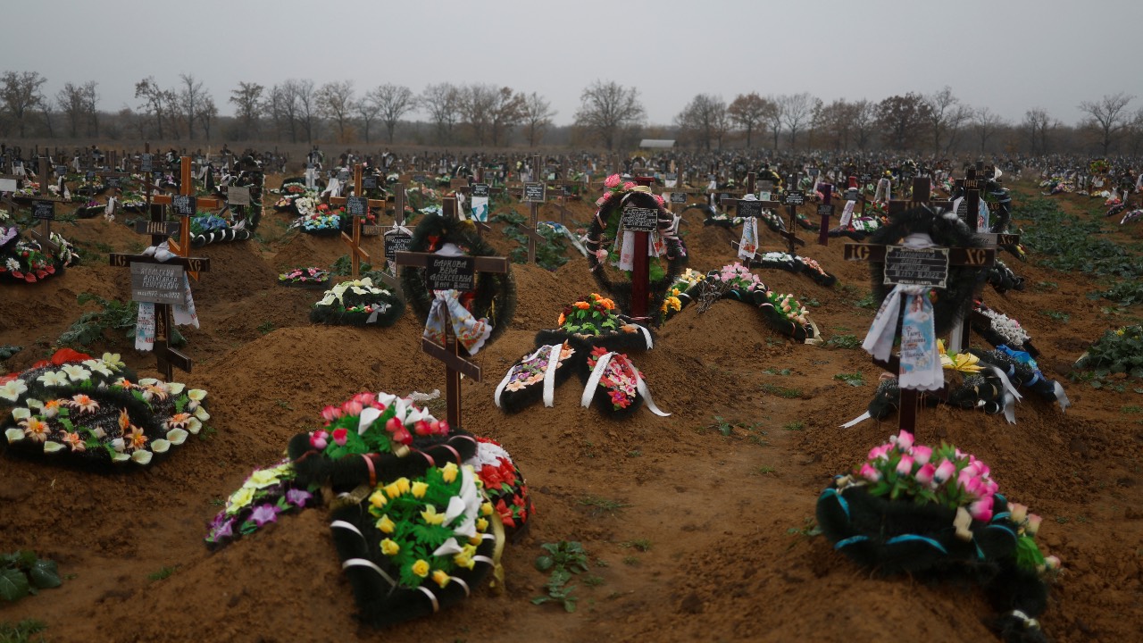Graves of people who died during a Russian occupation are seen at the city's cemetery after Russia's forces retreated from Kherson. /Valentyn Ogirenko/Reuters