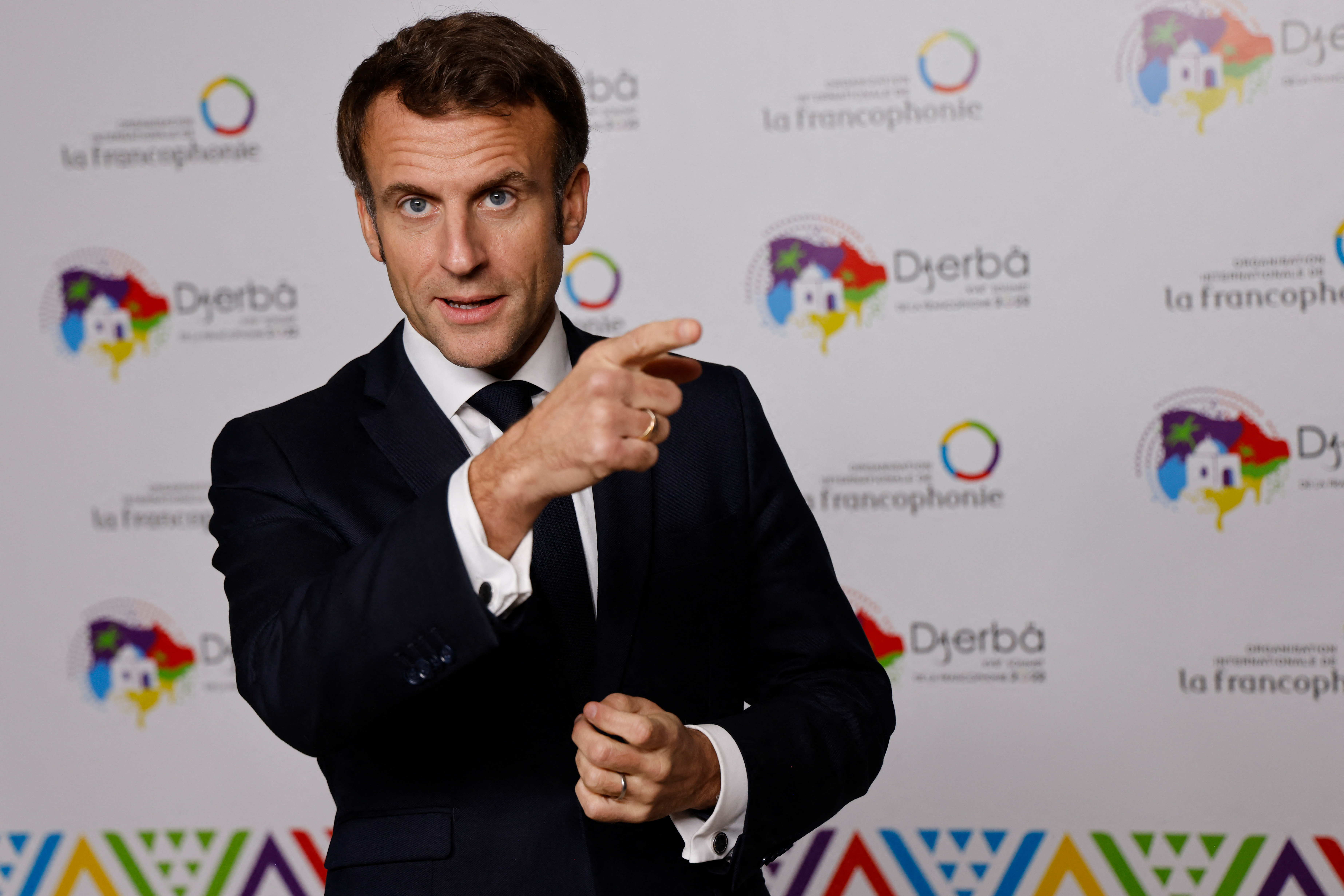 France's President Emmanuel Macron speaks to the press during at the 18th Francophone countries Summit in Djerba, on Saturday. Ludovic Marin/ AFP