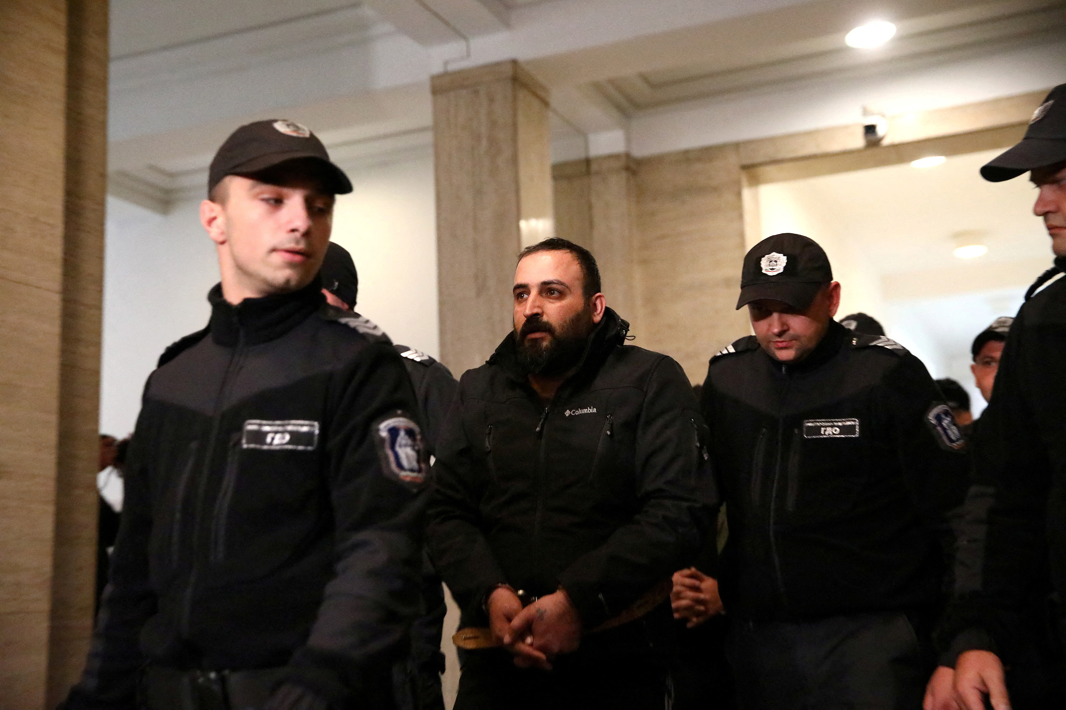 A man charged with allegedly supporting terrorist acts in connection with an explosion in Istanbul, is escorted to the courtroom, Sofia, Bulgaria on Saturday. Reuters/Stringer