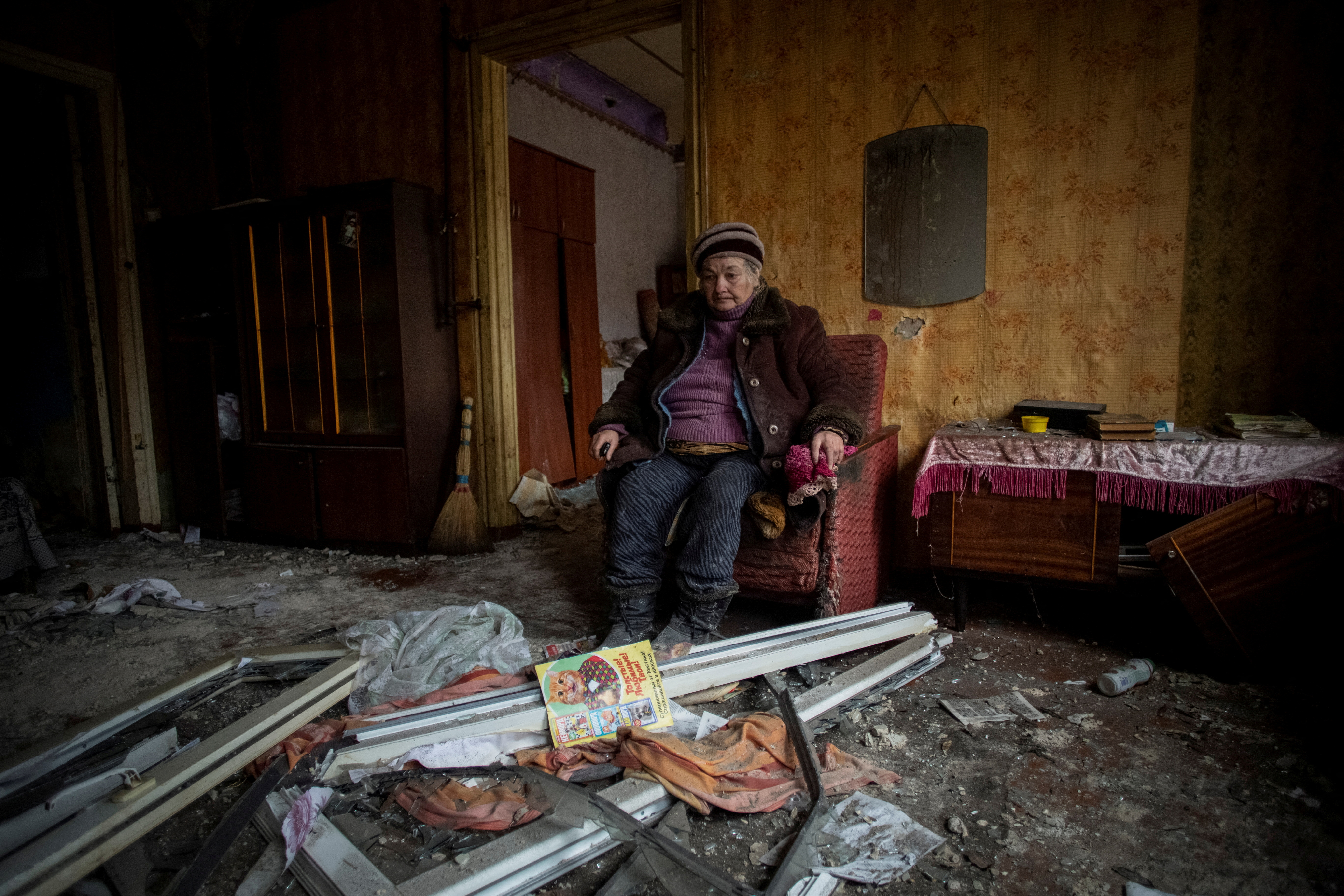 A woman sits in her destroyed home in Kramatorsk, southern Ukraine. Oleksandr Ratushniak/Reuters