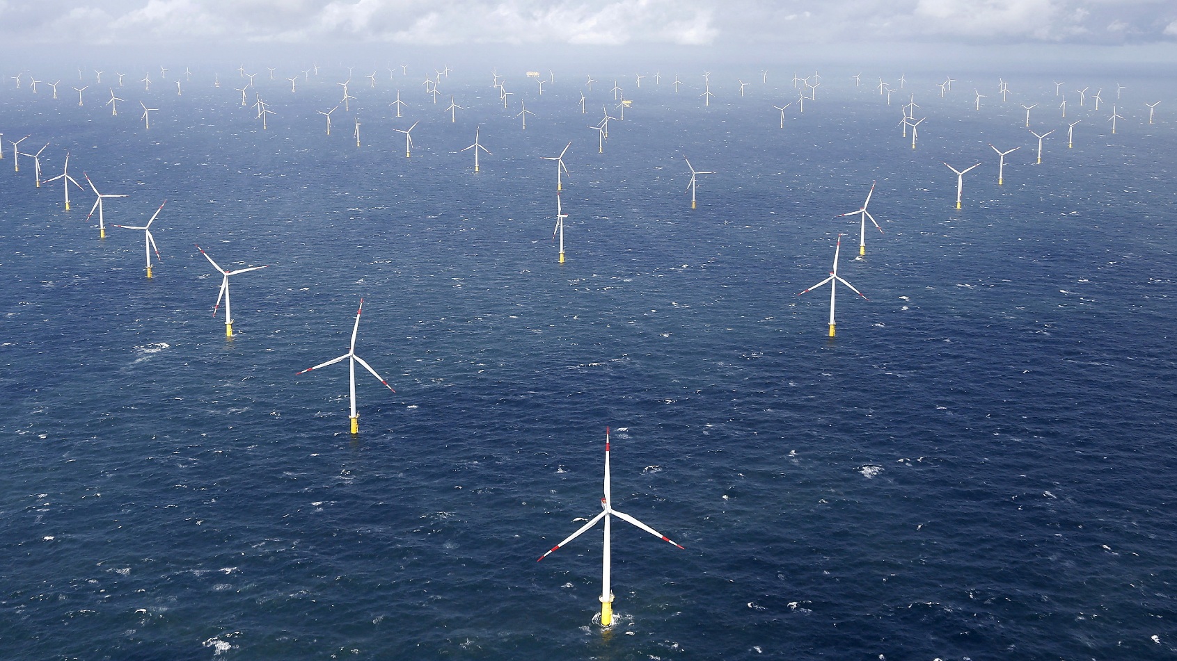Power-generating windmill turbines near the island of Amrum, Germany./ Morris Mac Matzen/Reuters