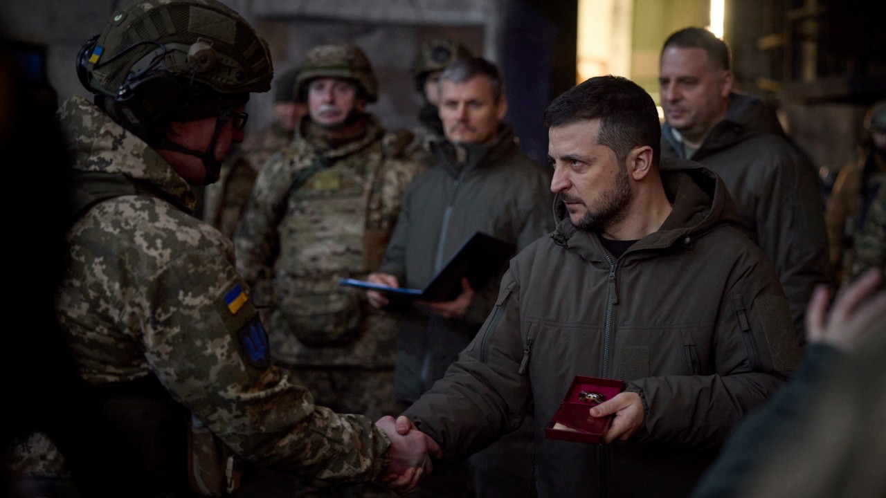 Zelenskyy meets with service members in Bakhmut. /Ukrainian Presidential Press Service/Reuters
