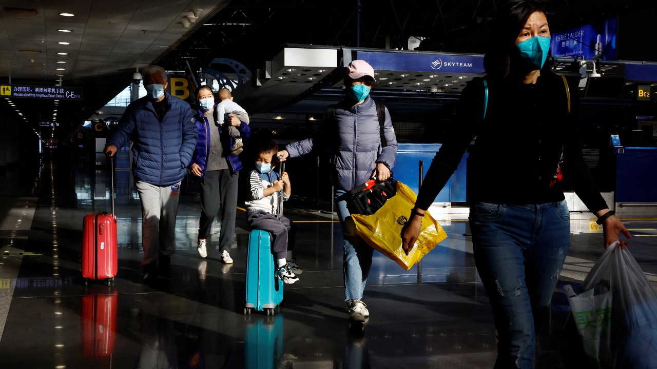 Weighing on many people's travel plans is the wave of COVID-19 infections now sweeping China. /Tingshu Wang/Reuters