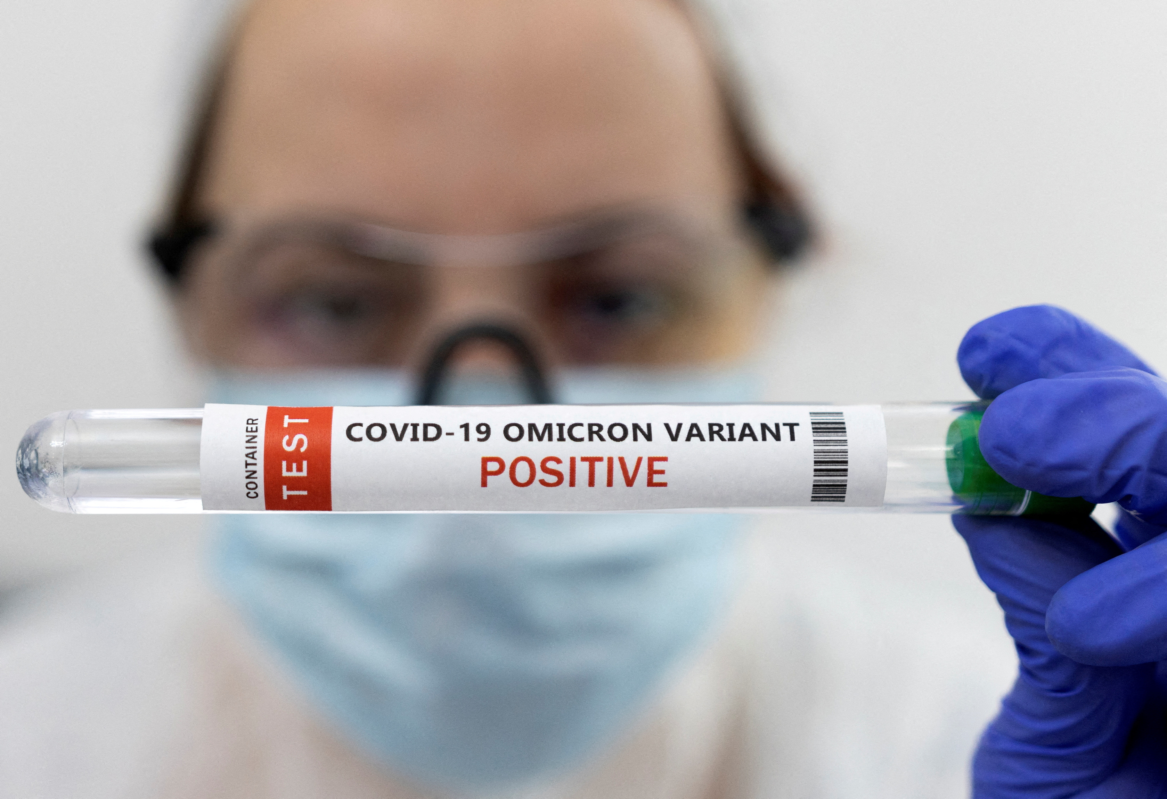 A test tube labelled 'COVID-19 Omicron variant test positive'  -  a photo taken in January 2022.. Reuters/Dado Ruvic/File Photo