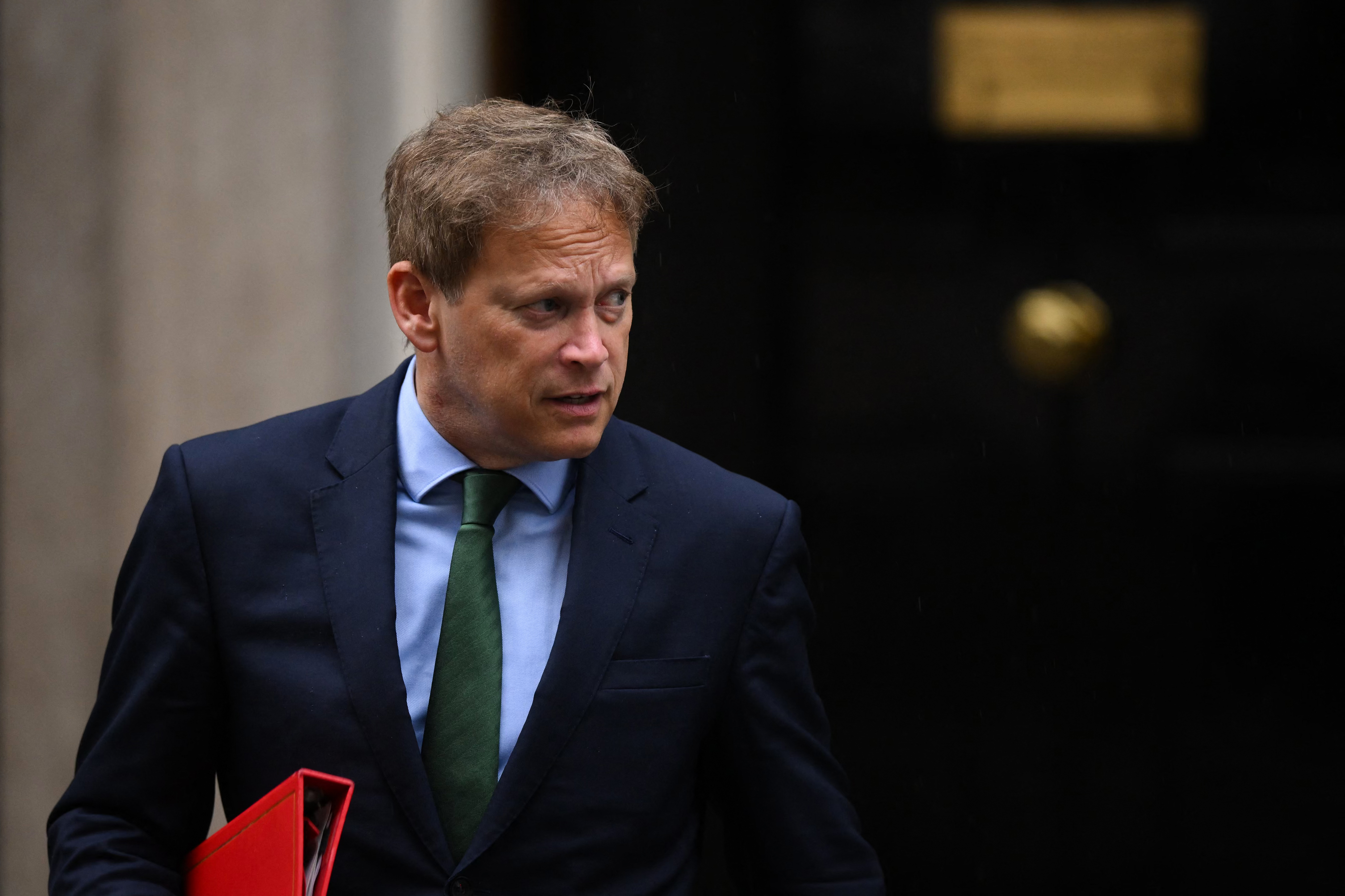 Britain's Business, Energy and Industrial Strategy Secretary Grant Shapps  introduced the legislation in Parliament on Tuesday. /Daniel Leal/AFP