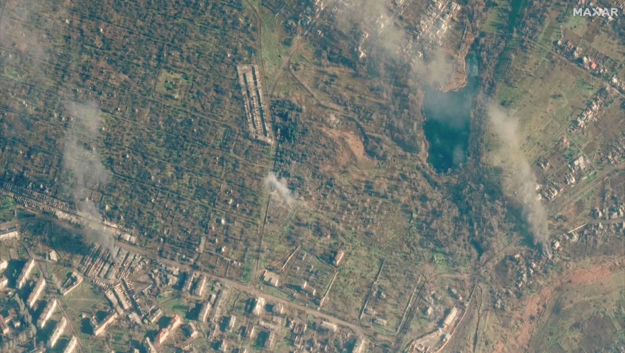 A satellite view shows smoldering buildings in Soledar. /Satellite image 2023 Maxar Technologies/Reuters