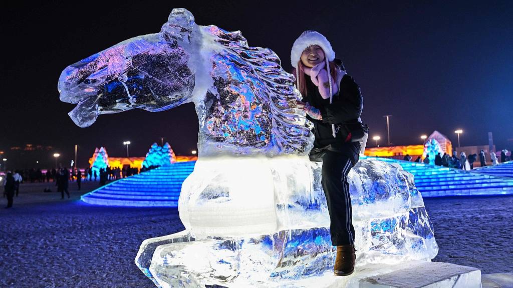 An Ice and Snow Festival visitor having fun. /CFP