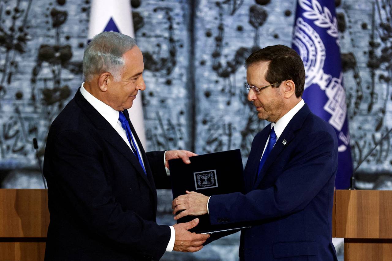 Israel President Isaac Herzog has pleaded with the prime minister to seek unity with his government's planned reforms. /Ronen Zvulun/Reuters