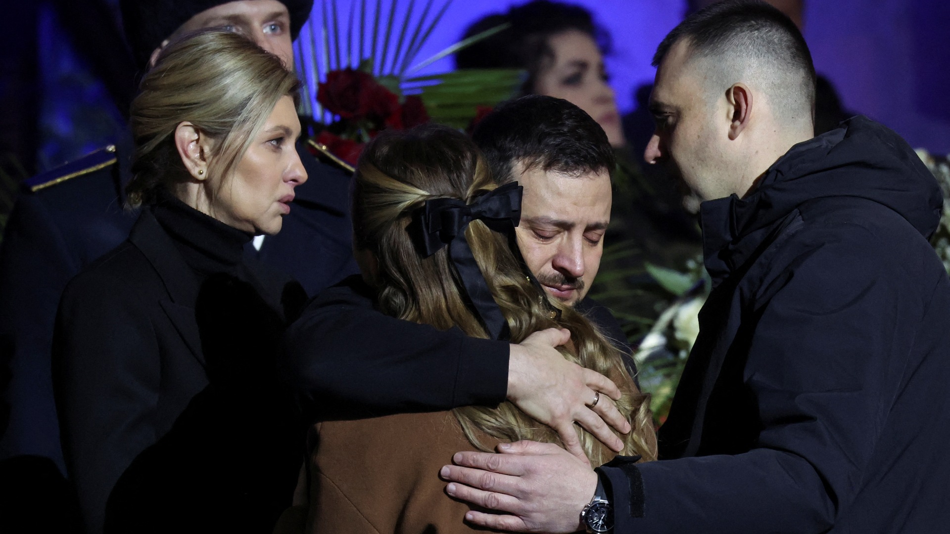 Volodymyr Zelenskyy and first lady Olena Zelenska attend a memorial ceremony for those who died in the Kyiv helicopter crash. /Nacho Doce/Reuters