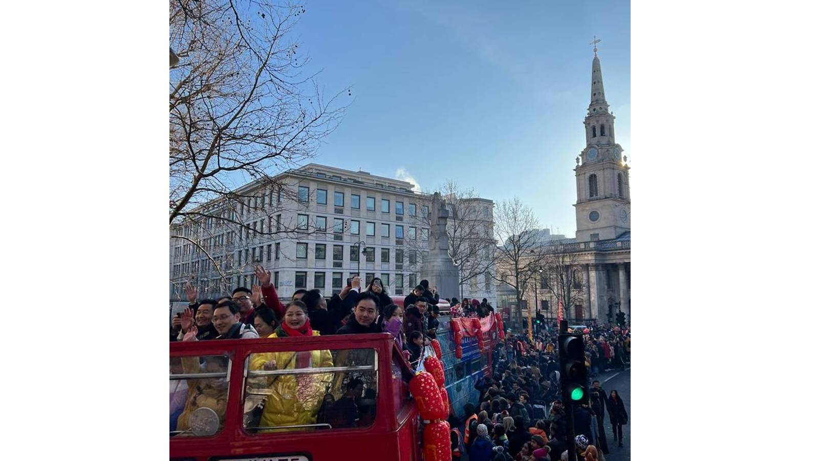 Some revelers even boarded traditional London buses that were part of the parade. /LCCA