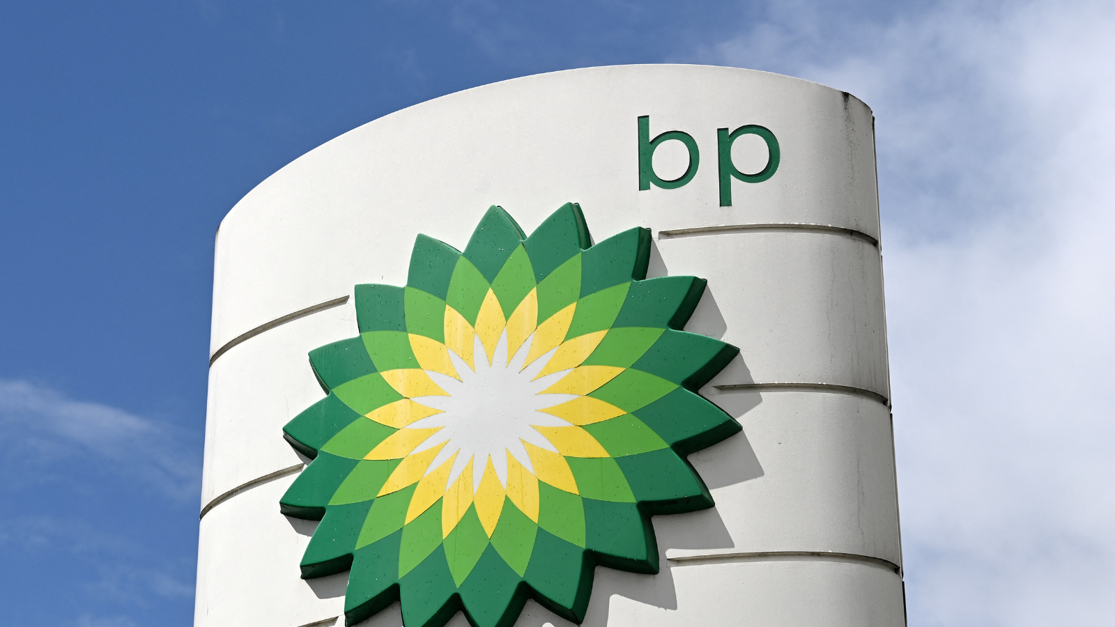 BP has recorded record profits of $27 billion but has announced it is scaling back its commitment to reduce emissions by up to 40% by 2030 to just '20 to 30%.' /Glyn Kirk/AFP
