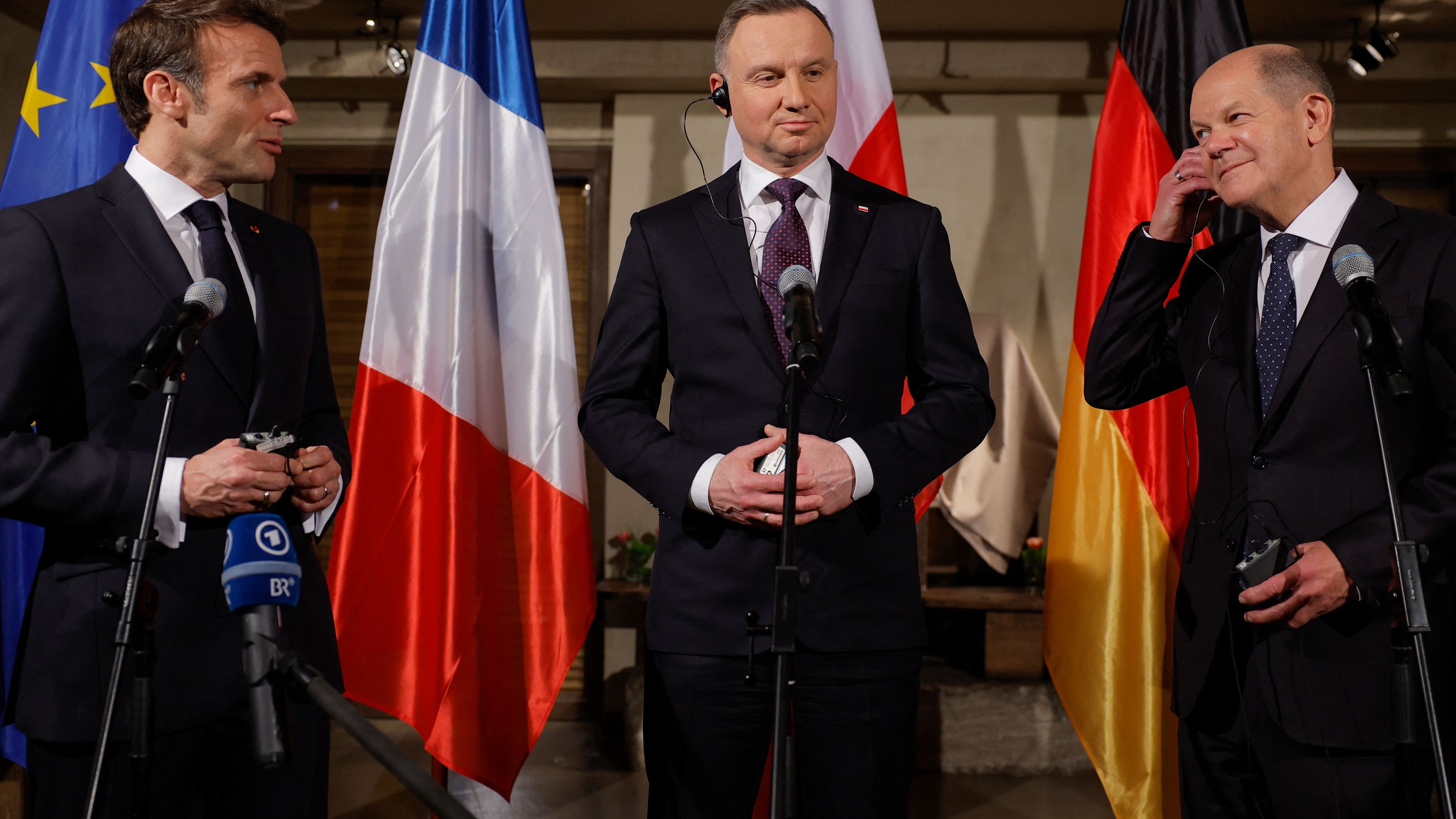 French President Emmanuel Macron, Poland's President Andrzej Duda and German Chancellor Olaf Scholz are in Munich for the security conference. /Odd Andersen/AFP