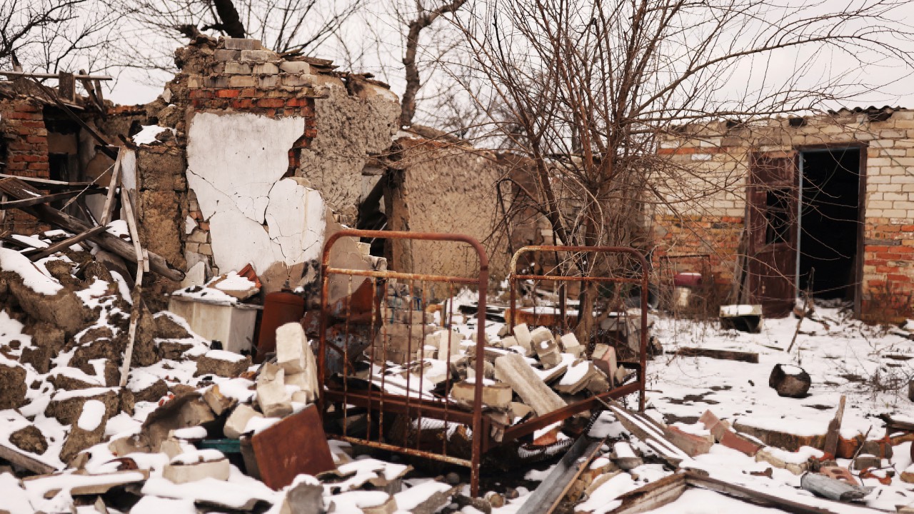 A bed is pictured in a house destroyed during the months of Russian occupation in the village of Posad-Pokrovske, northwest of the city of Kherson. /Nacho Doce/Reuters