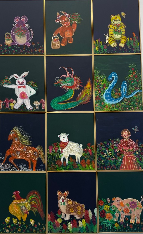 Paintings of Chinese zodiac signs in Madrid's 'Ellas' exhibition. /Ken Browne/CGTN