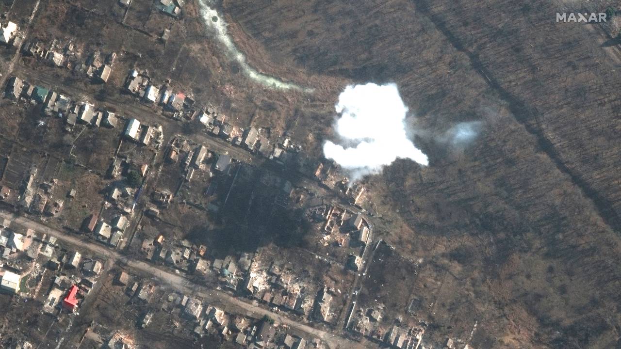 A satellite image shows smoke from recently dropped ordnance in southern Bakhmut. /Maxar Technology/Handout via Reuters