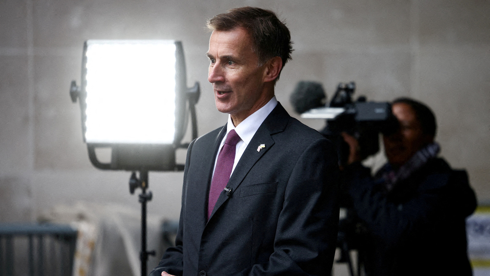 UK Chancellor Jeremy Hunt says some of the country's most important companies could've been wiped out had HSBC not made its purchase. /Reuters/Henry Nicholls.