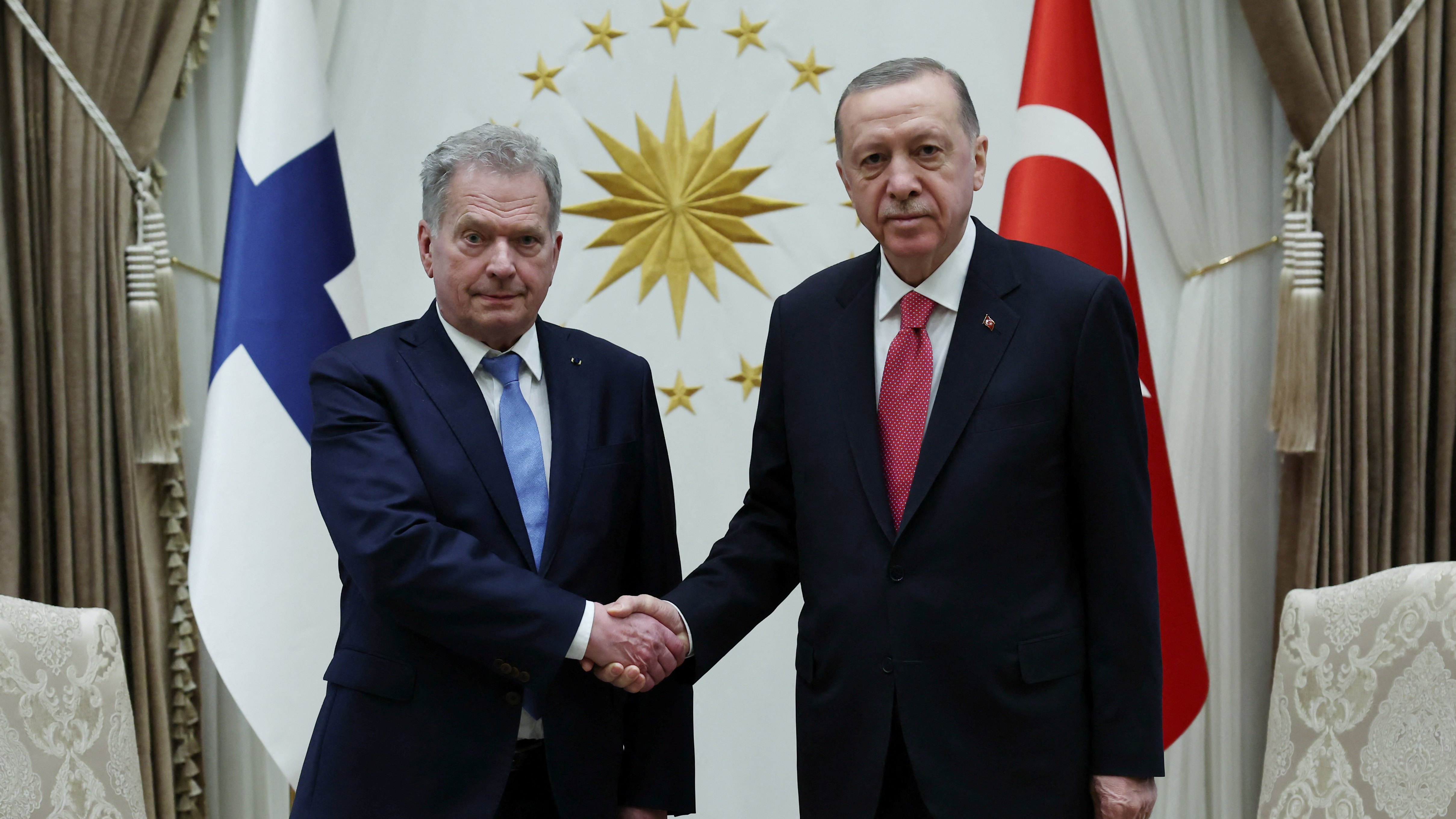 Türkiye's Recep Tayyip Erdogan and Finnish President Sauli Niinisto. /Reuters/Murat Cetinmuhurdar/Presidential Press Office/Handout