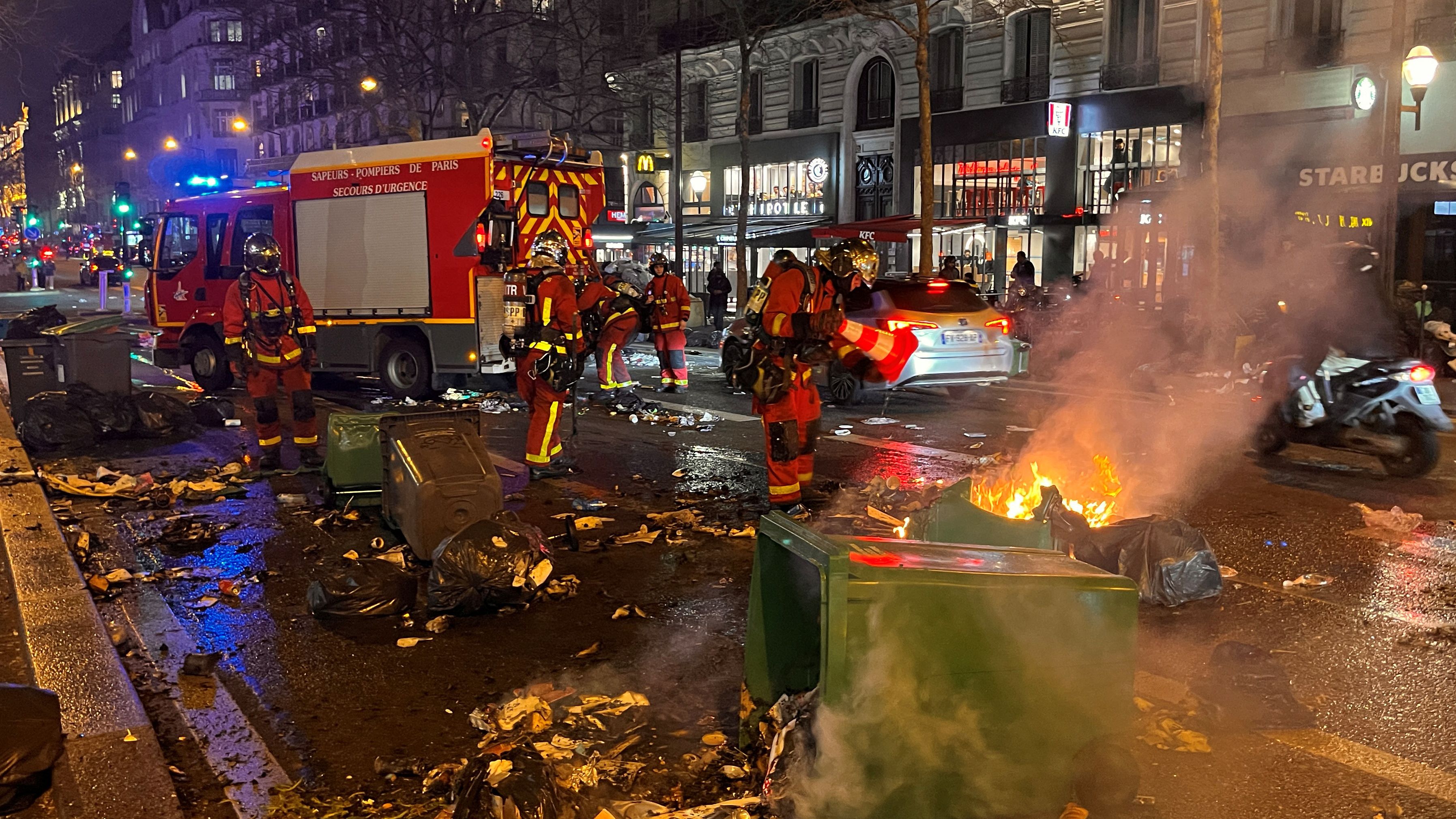 French firefighters deal with the damage after the protests in Paris. /Bart Biesemans /Reuters