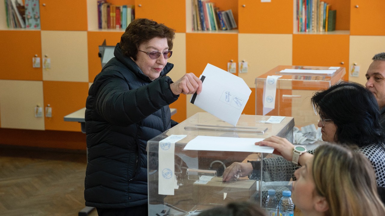A woman votes in Bulgarian parliamentary elections at a polling station in Sofia on April 2, 2023. /Nikolay Doychinov/AFP