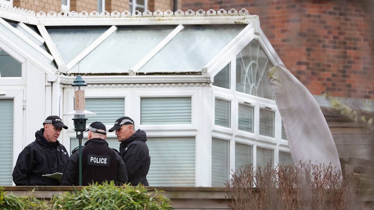 Police officers outside the house of former SNP Chief Executive Peter Murrell, husband of Scotland's former First Minister Nicola Sturgeon. /Russell Cheyne/Reuters