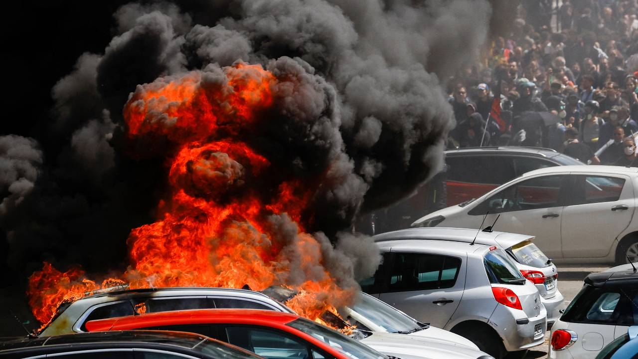 Black smoke billows from a burning car as demonstrators take part in the May Day labour march in Nantes, France. /Stephane Mahe/Reuters