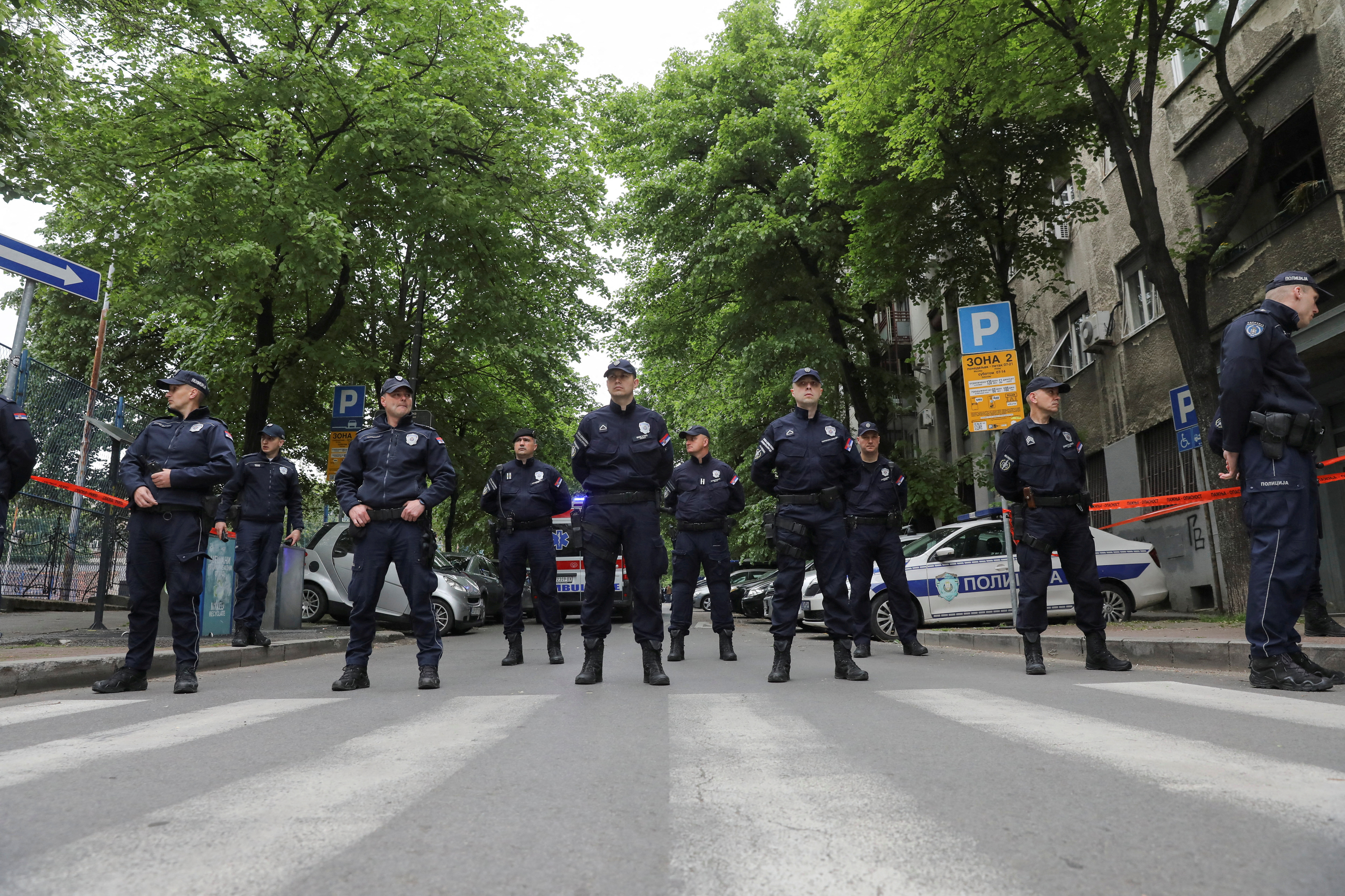 Police formed a cordon shortly after Serbia's deadliest shooting since 2013. /Reuters/Djordje Kojadinovic.