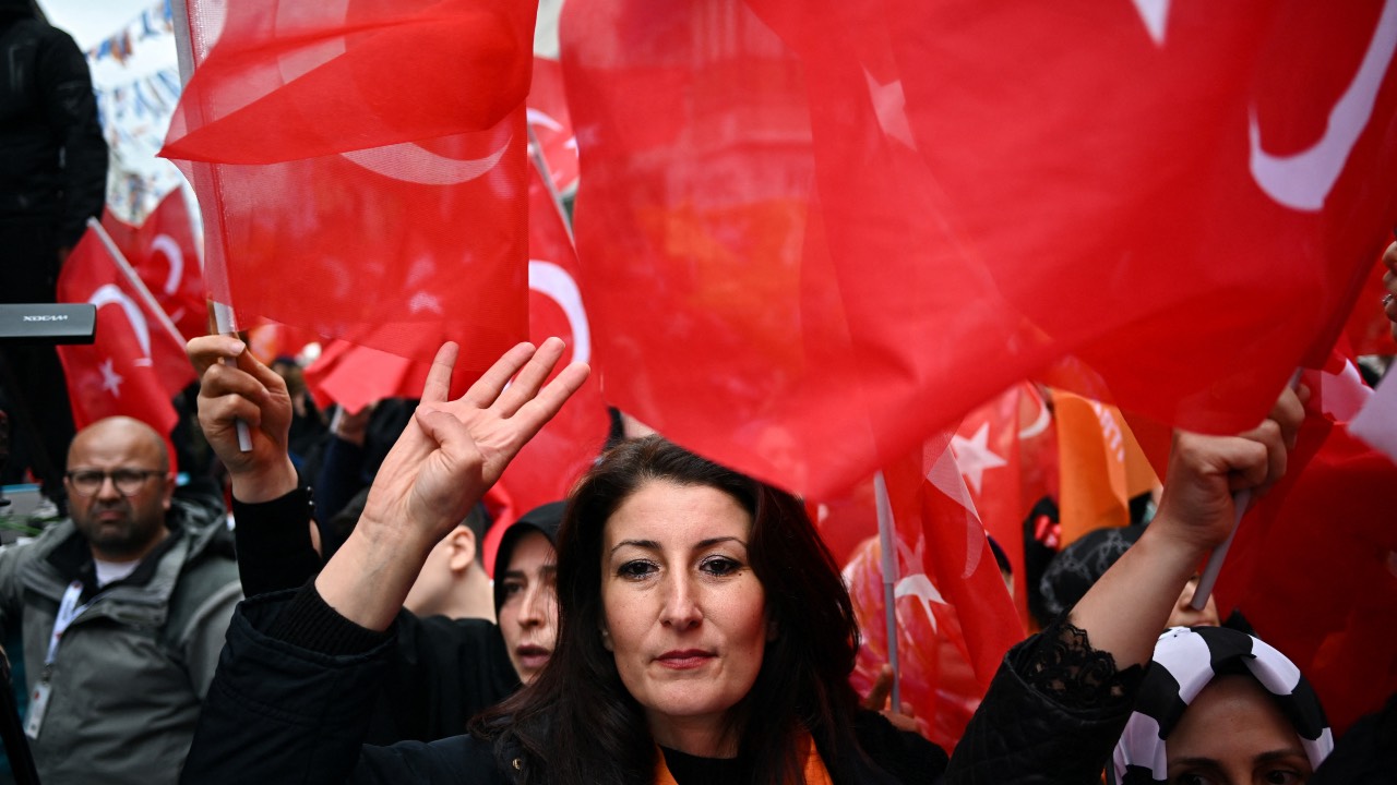 A supporter of Turkish President Tayyip Erdogan attends a rally in Istanbul on Friday. /Dylan Martinez/Reuters
