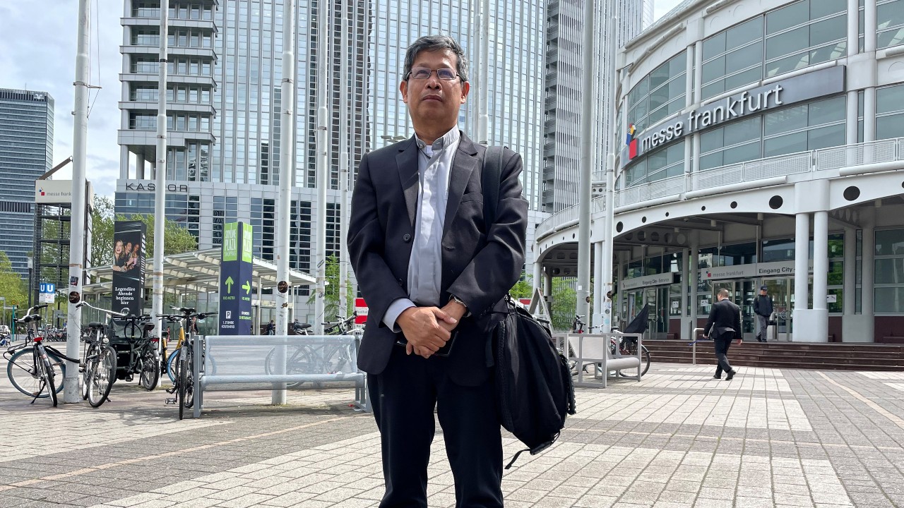 Edwin Gariguez – a Catholic priest from the Philippines, pictured in Frankfurt, Germany – is touring top European banks on environmental issues. /Tom Sims/Reuters