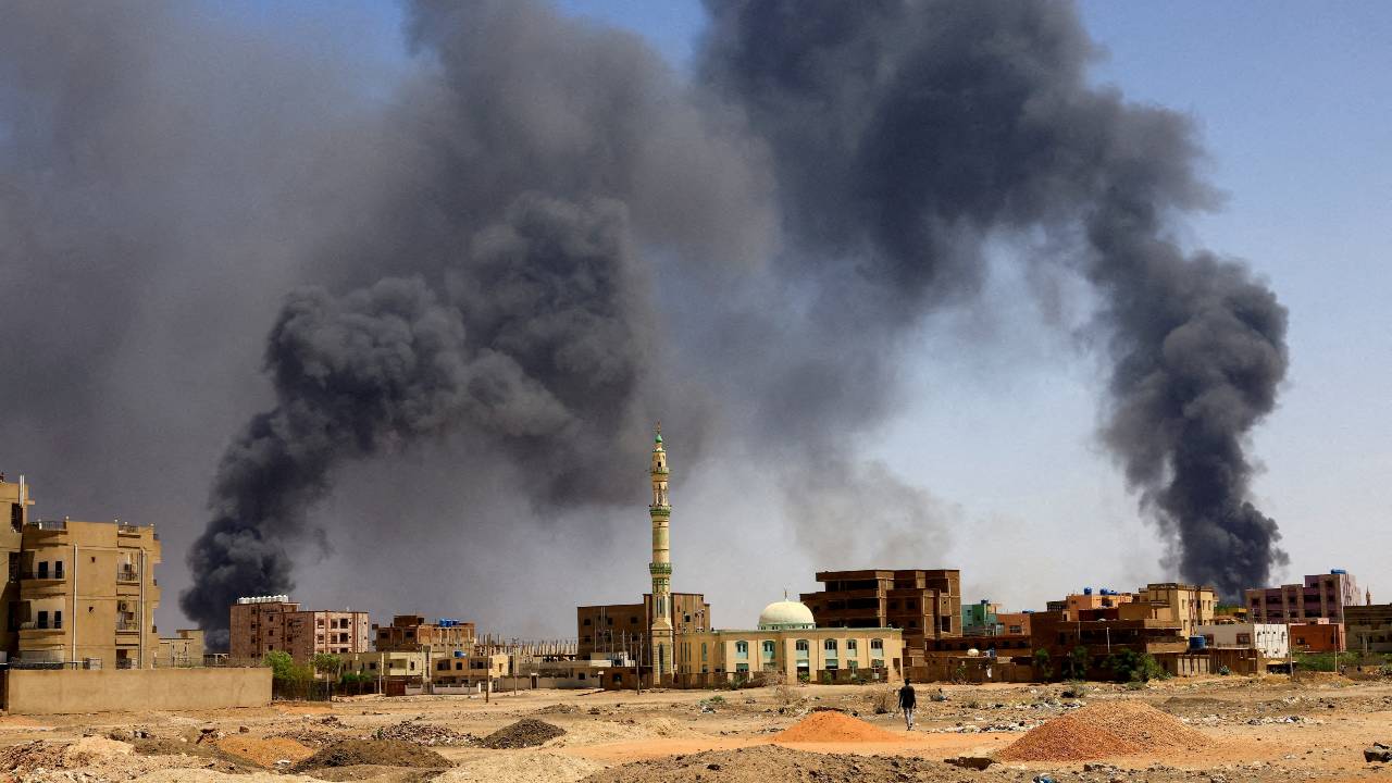 Smoke rises above buildings after aerial bombardment in Khartoum North on May 1. /Mohamed Nureldin Abdallah/Reuters
