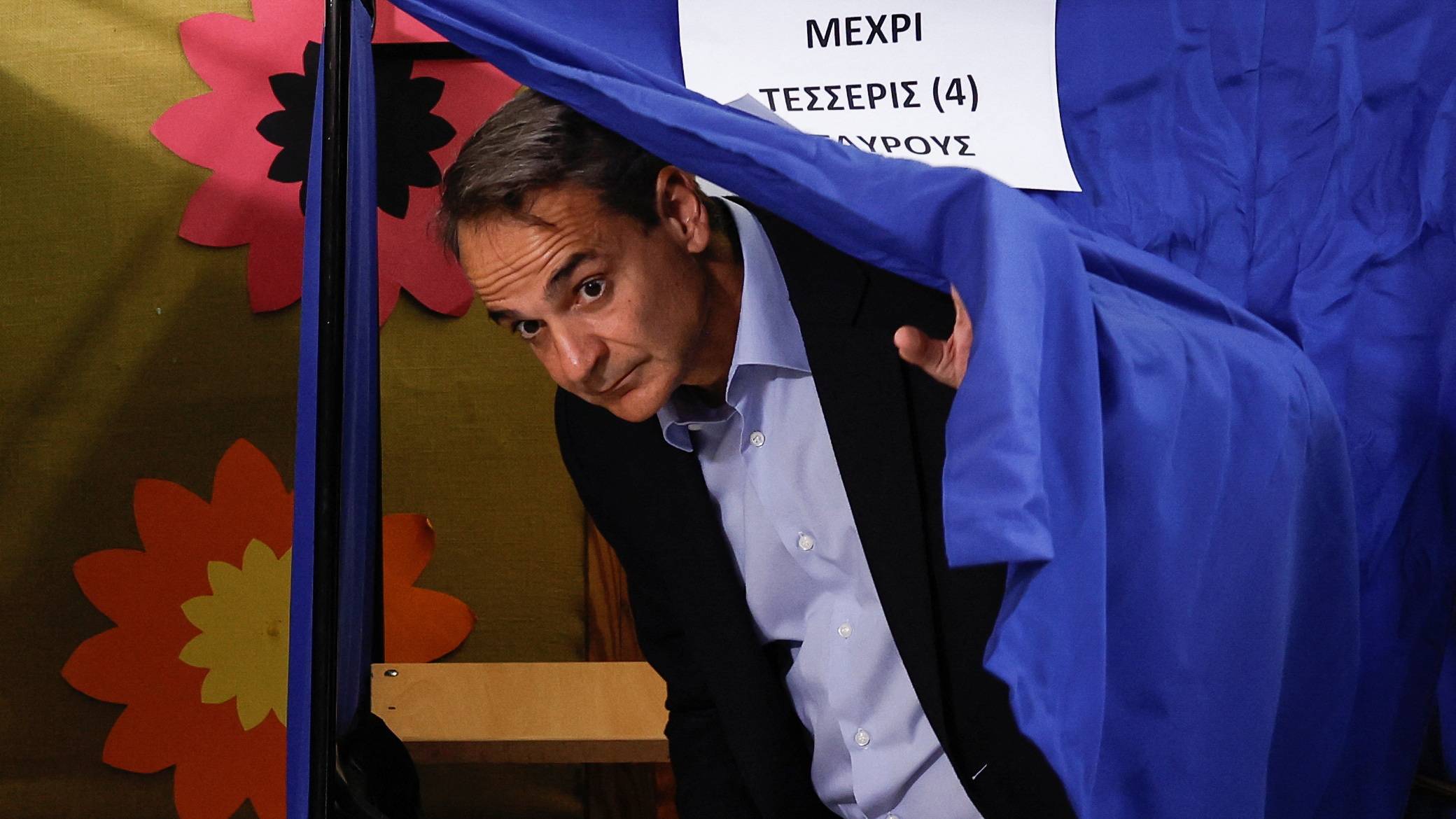 Greek Prime Minister Kyriakos Mitsotakis exits a voting booth at a polling station in Athens. /Louiza Vradi/Reuters