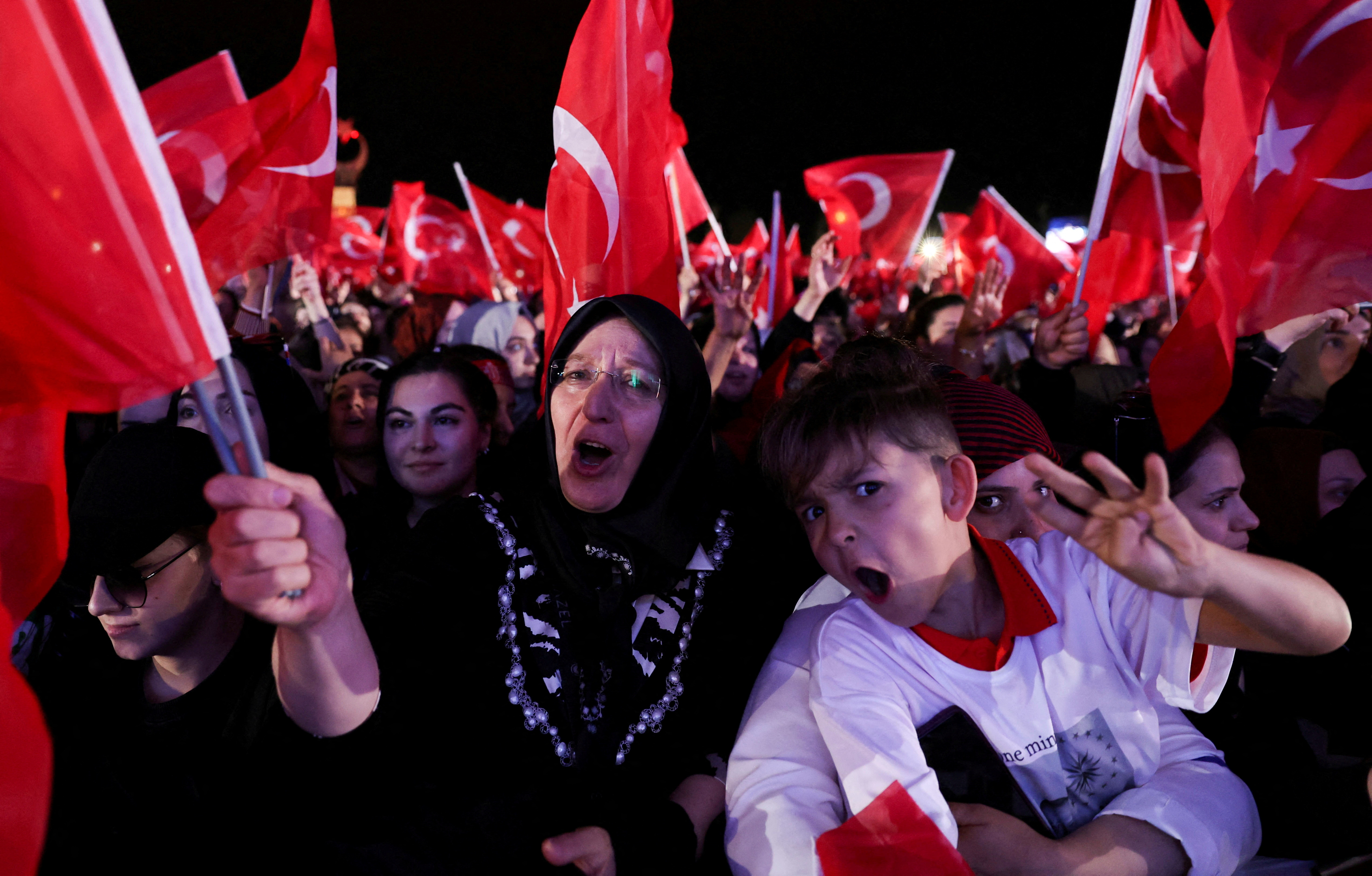Supporters of Erdogan celebrate following his victory in the second round of the presidential election. /Umit Bektas / Reuters