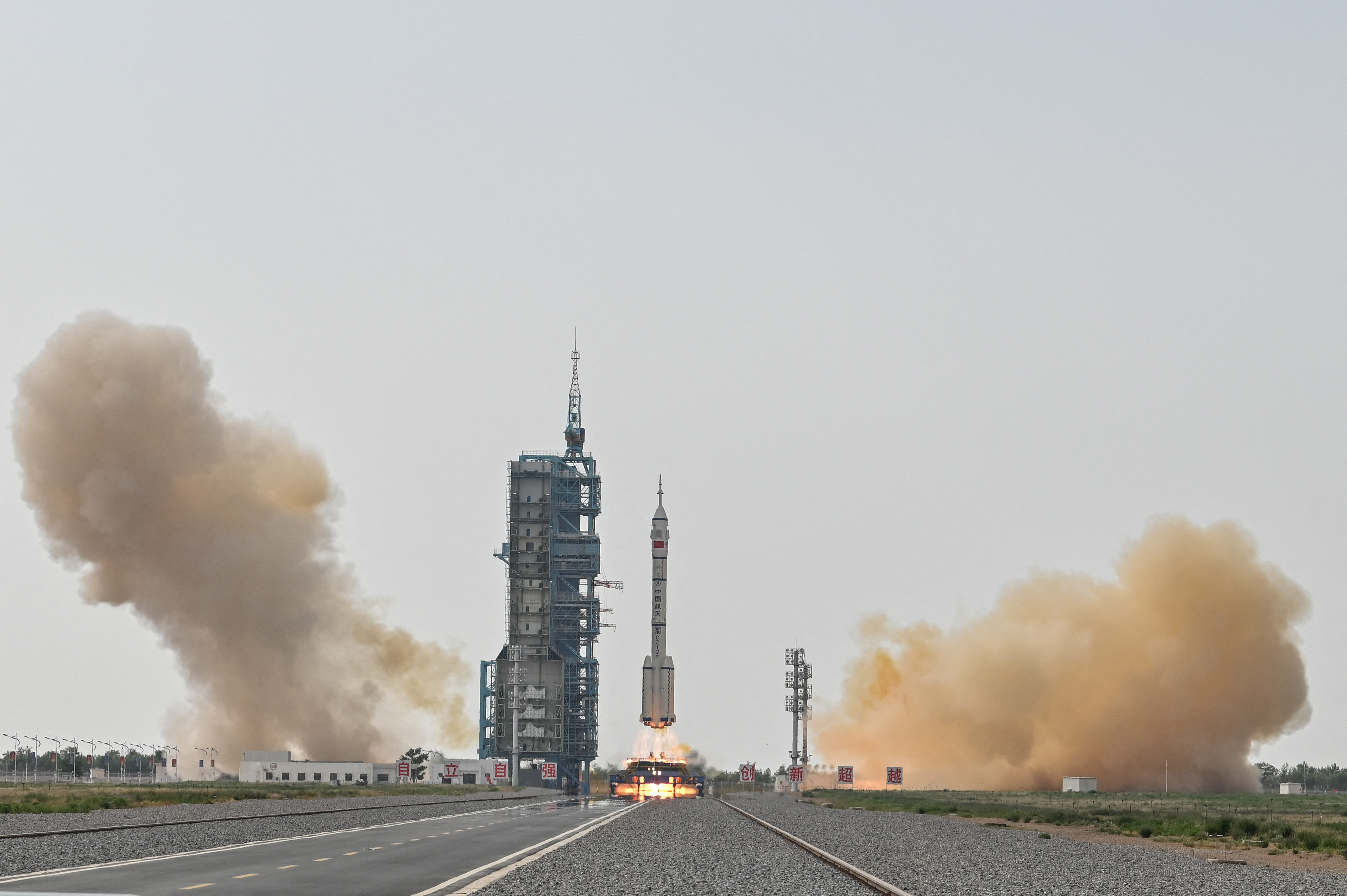 The three taikonauts aboard the Shenzou-16 spaceship entered the China Space Station on Tuesday. /Hector Retamal/AFP