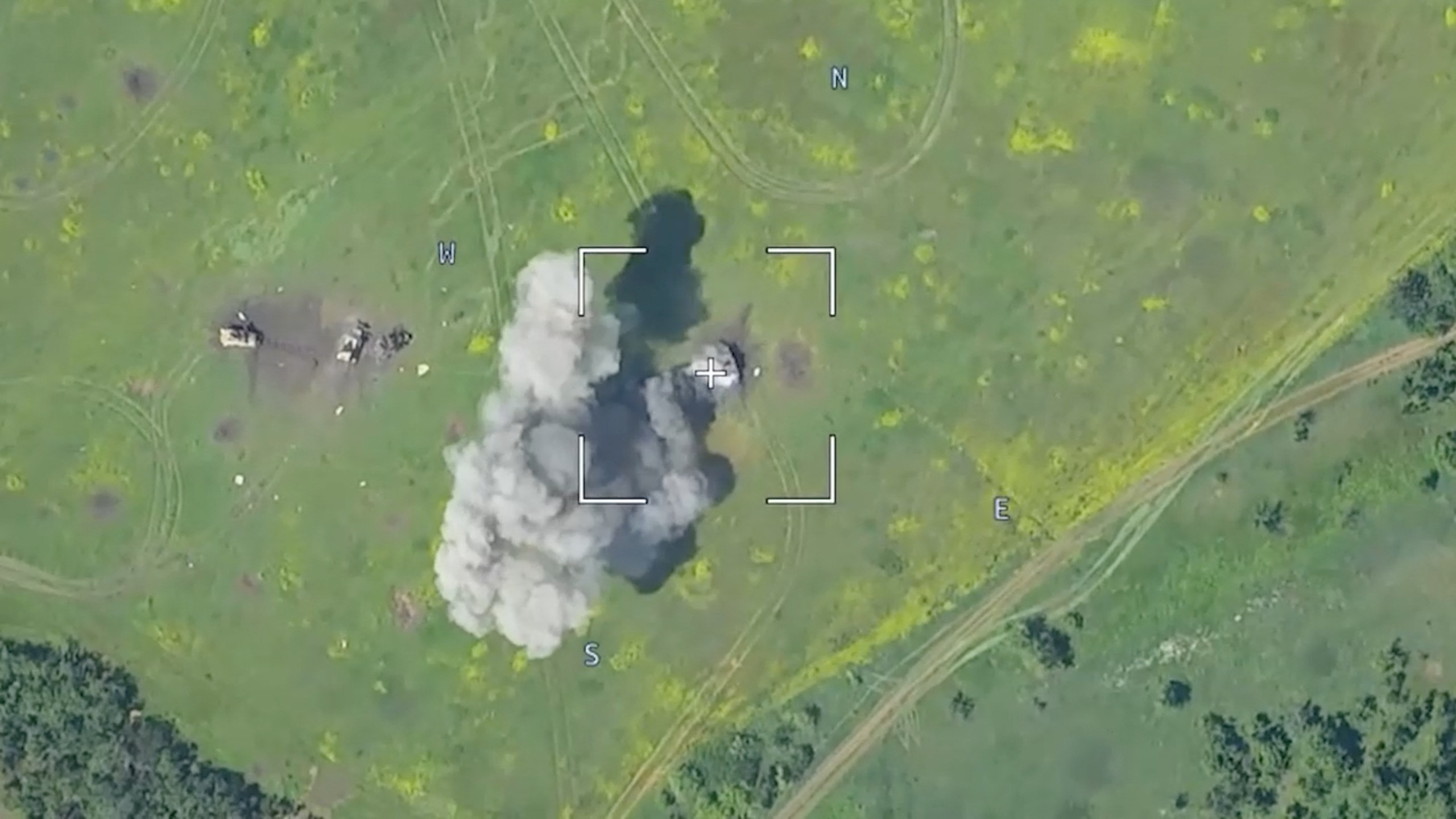 Drone footage shows a burning armoured vehicle in an unidentified location after the Defence Ministry in Moscow said that Russian forces have thwarted a major Ukrainian offensive in the southern Ukrainian region of Donetsk./Reuters via third party.