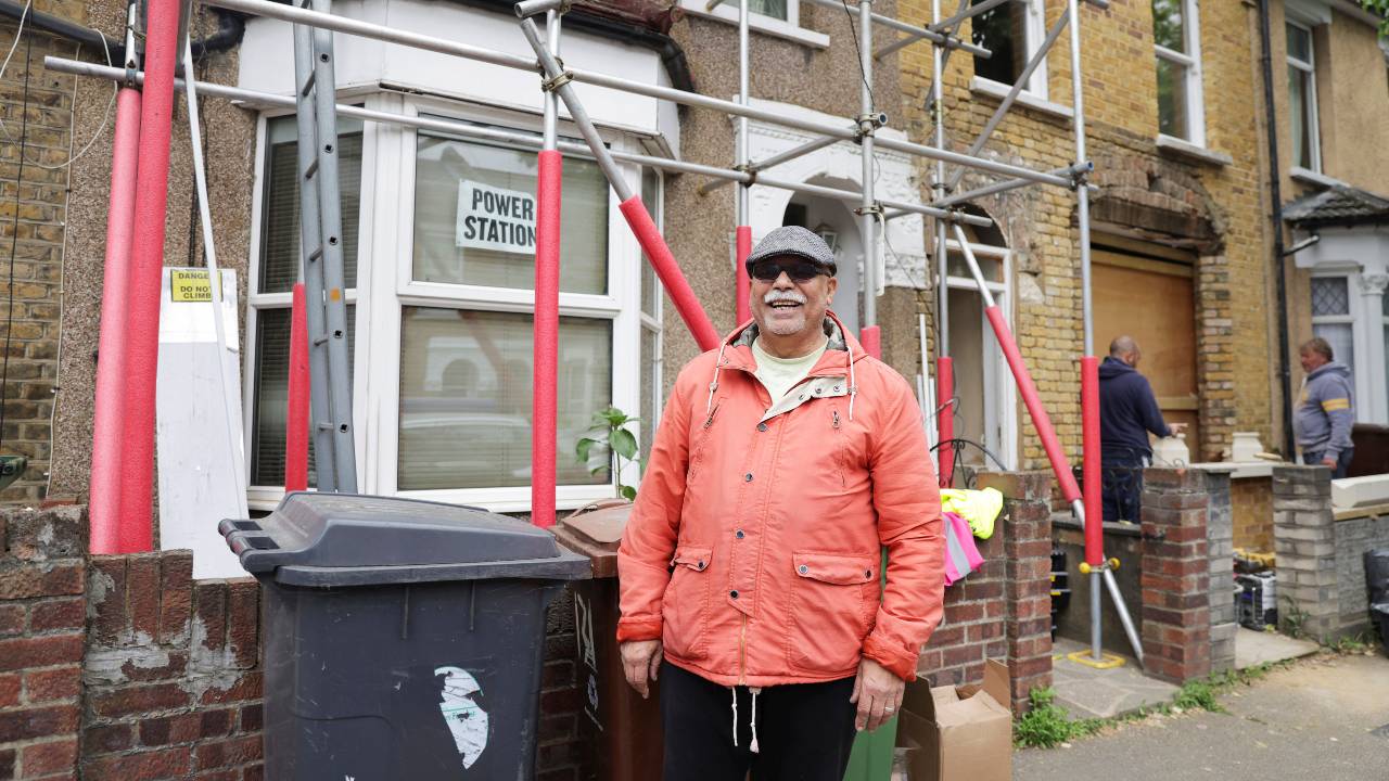 Neighbor Ejaz Hussain says he can't afford his energy bills anymore so the panels 
