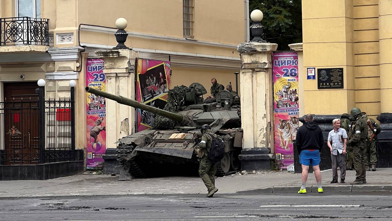 Fighters of Wagner private mercenary group are seen atop of a tank in a street in Rostov-on-Don. Stringer/Reuters