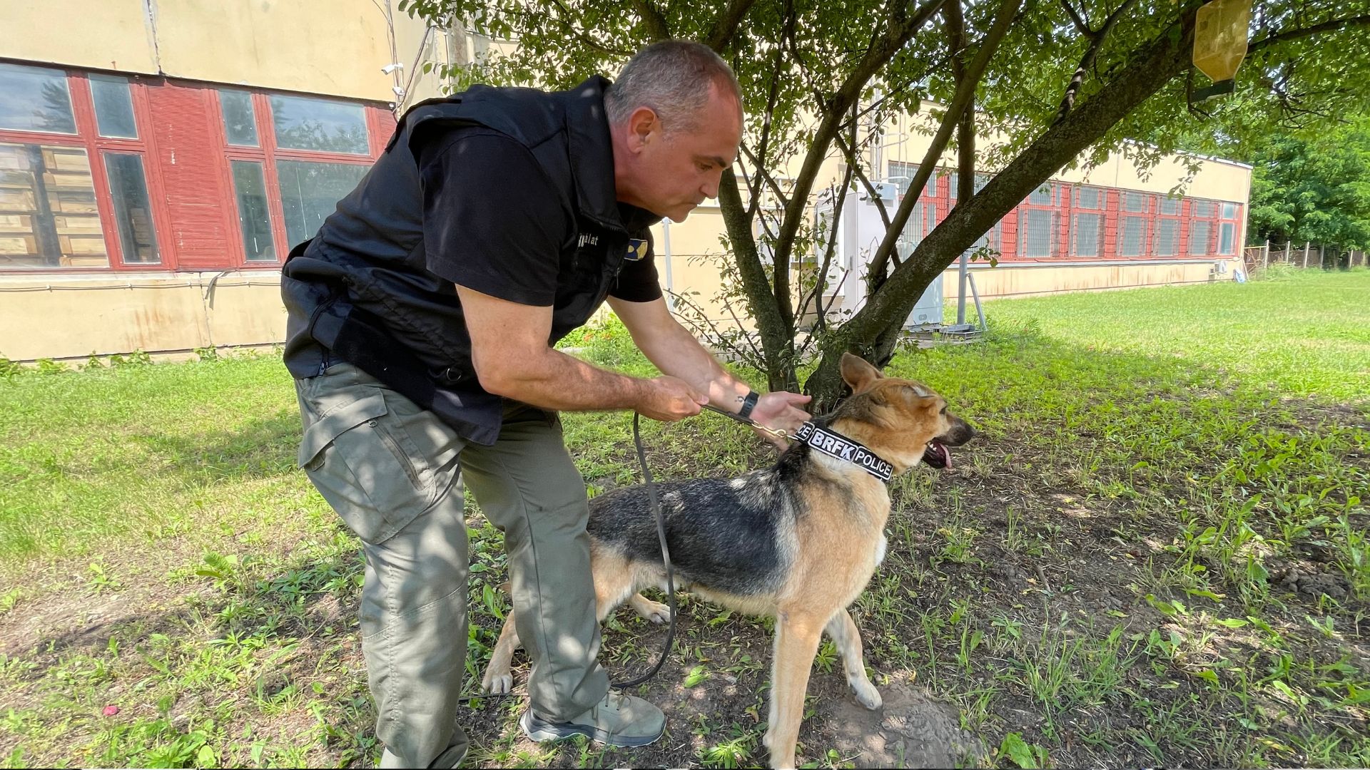 Rambo trains with his police handler Lt. Col. Gylua Desko. /CGTN