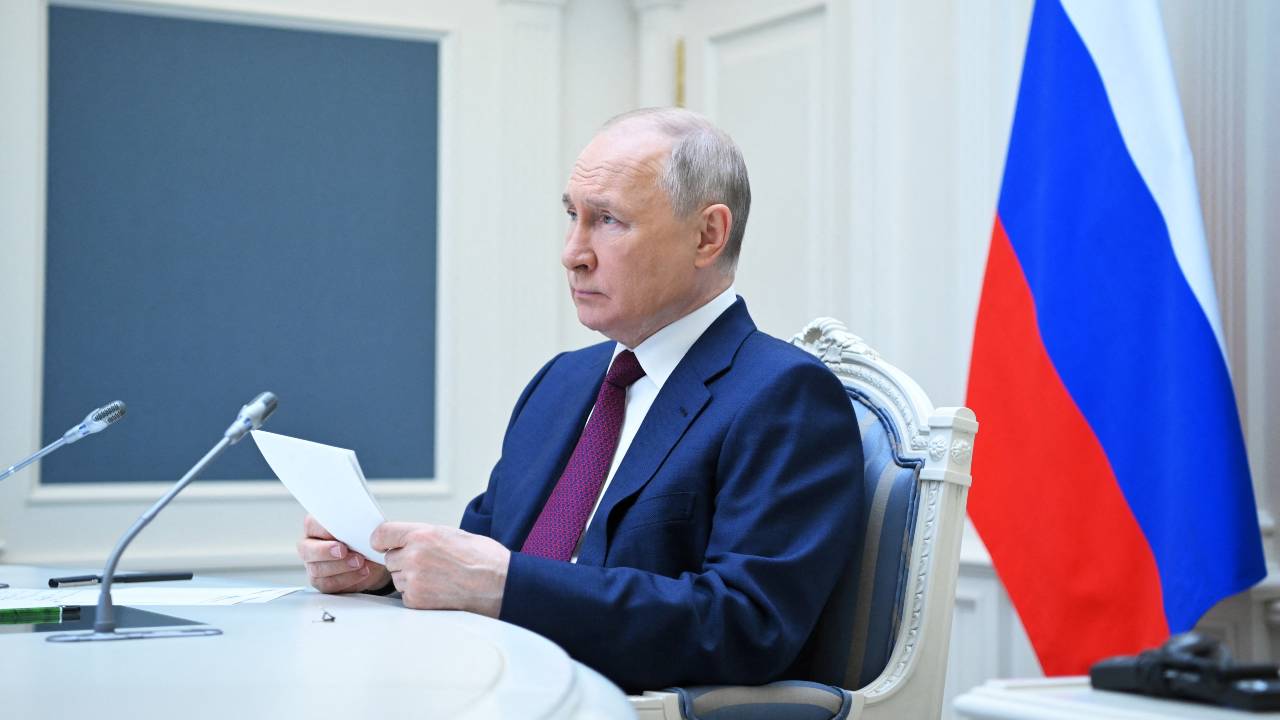 Russian President Vladimir Putin attends a Shanghai Cooperation Organisation video conference at the Kremlin. /Sputnik/Alexander Kazakov/Kremlin/Reuters