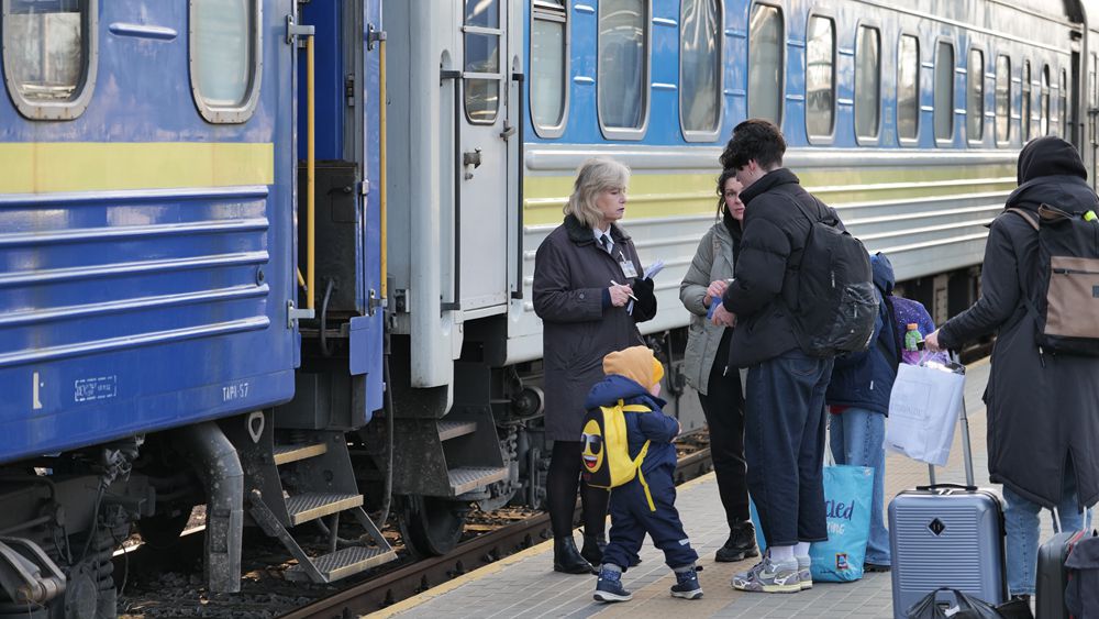 Women passengers wait to aboard the train from Chelm, Poland to Kyiv, Ukraine. /CGTN
