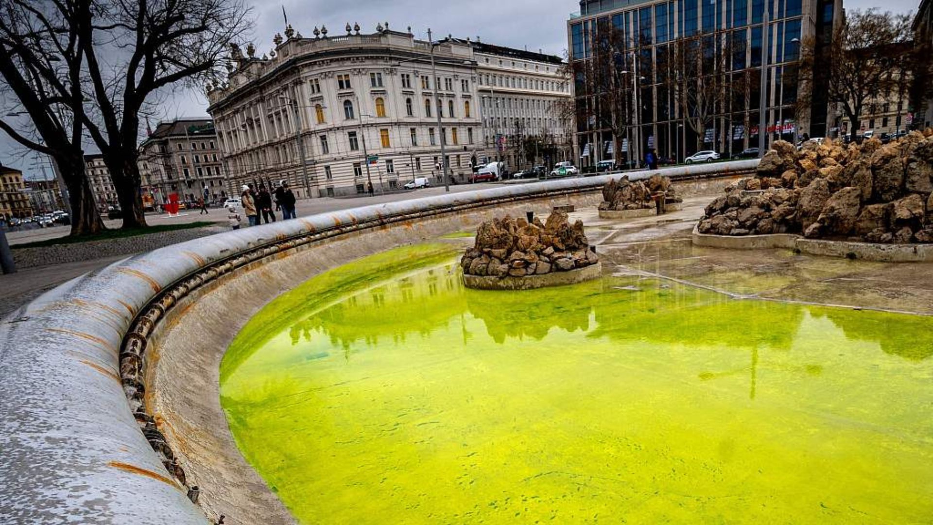 A fountain in front of a Soviet World War II memorial in Vienna which was dyed green by climate activists. /Joe Klamar/CFP