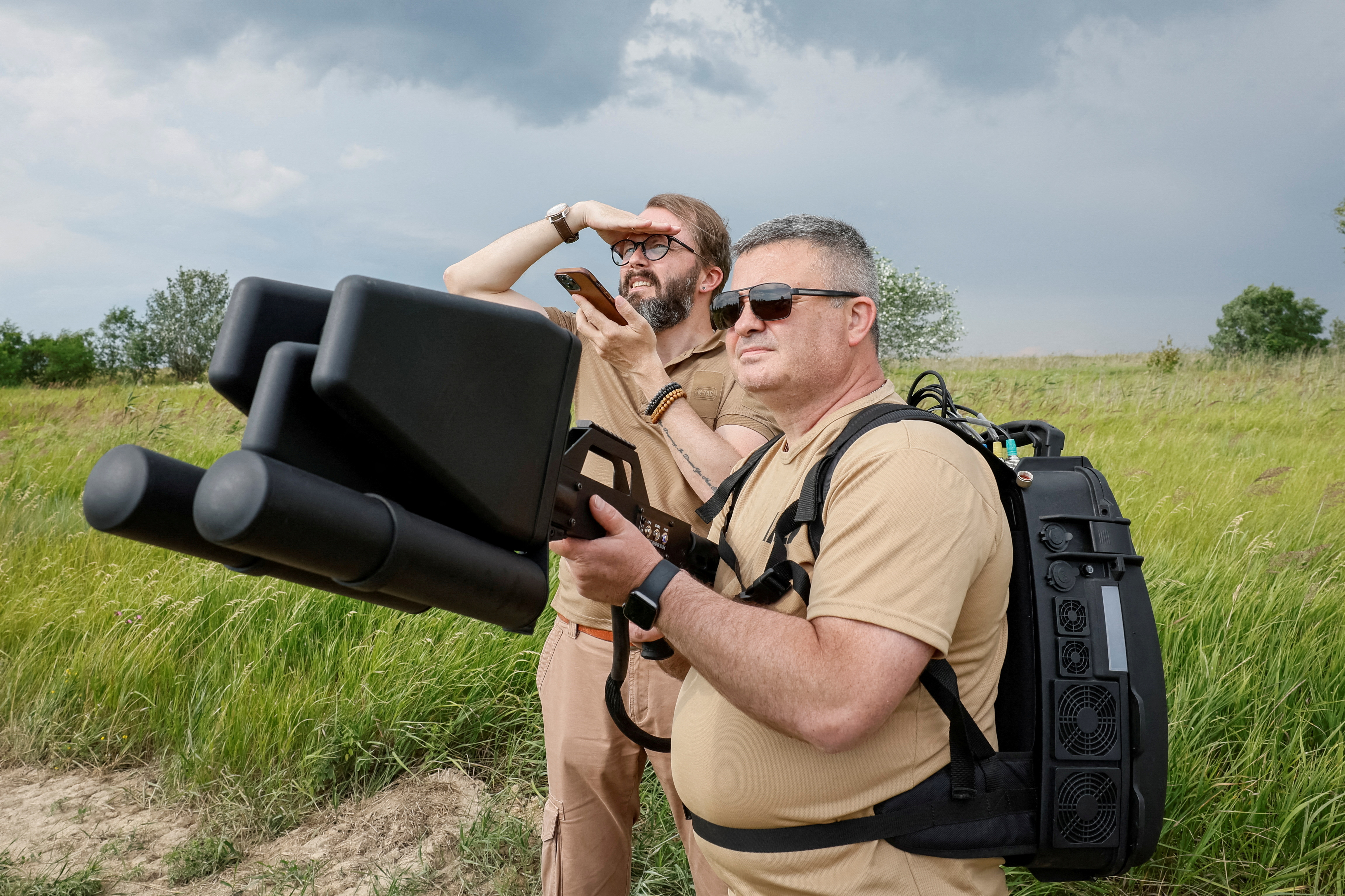 Drones have played a key role in the Russia-Ukraine conflict. Here, 
Anatoliy Khrapchynskyi and Yuriy Momot, who work for a firm developing Ukrainian electronic warfare technology, use an anti-drone gun during practice. Reuters/Alina Smutko.
