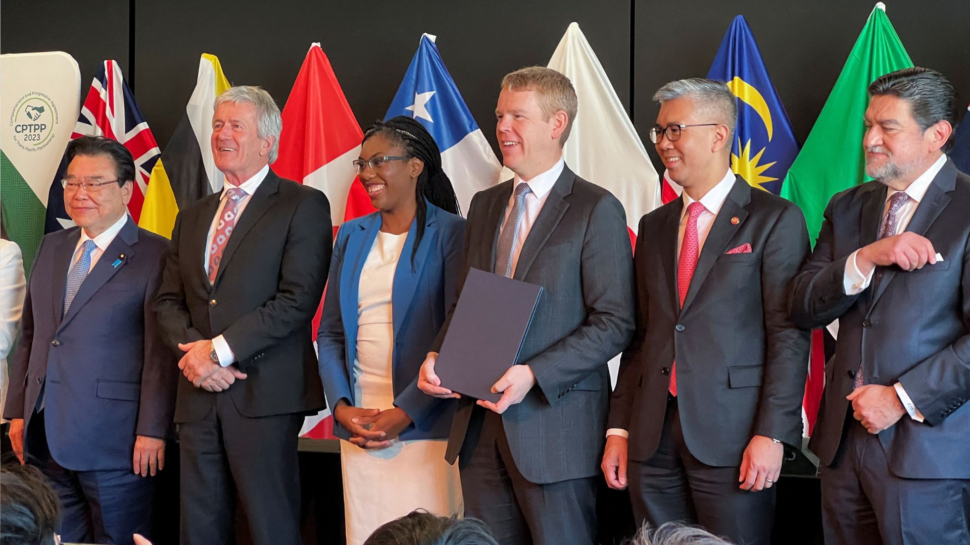 UK Business and Trade Secretary Kemi Badenoch (third from left) praised the deal. /Lucy Craymer/Reuters